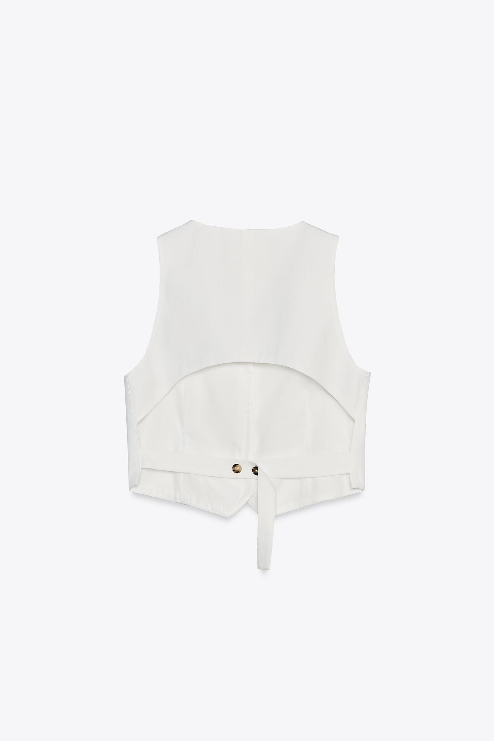 BACK CUT OUT VEST Product Image