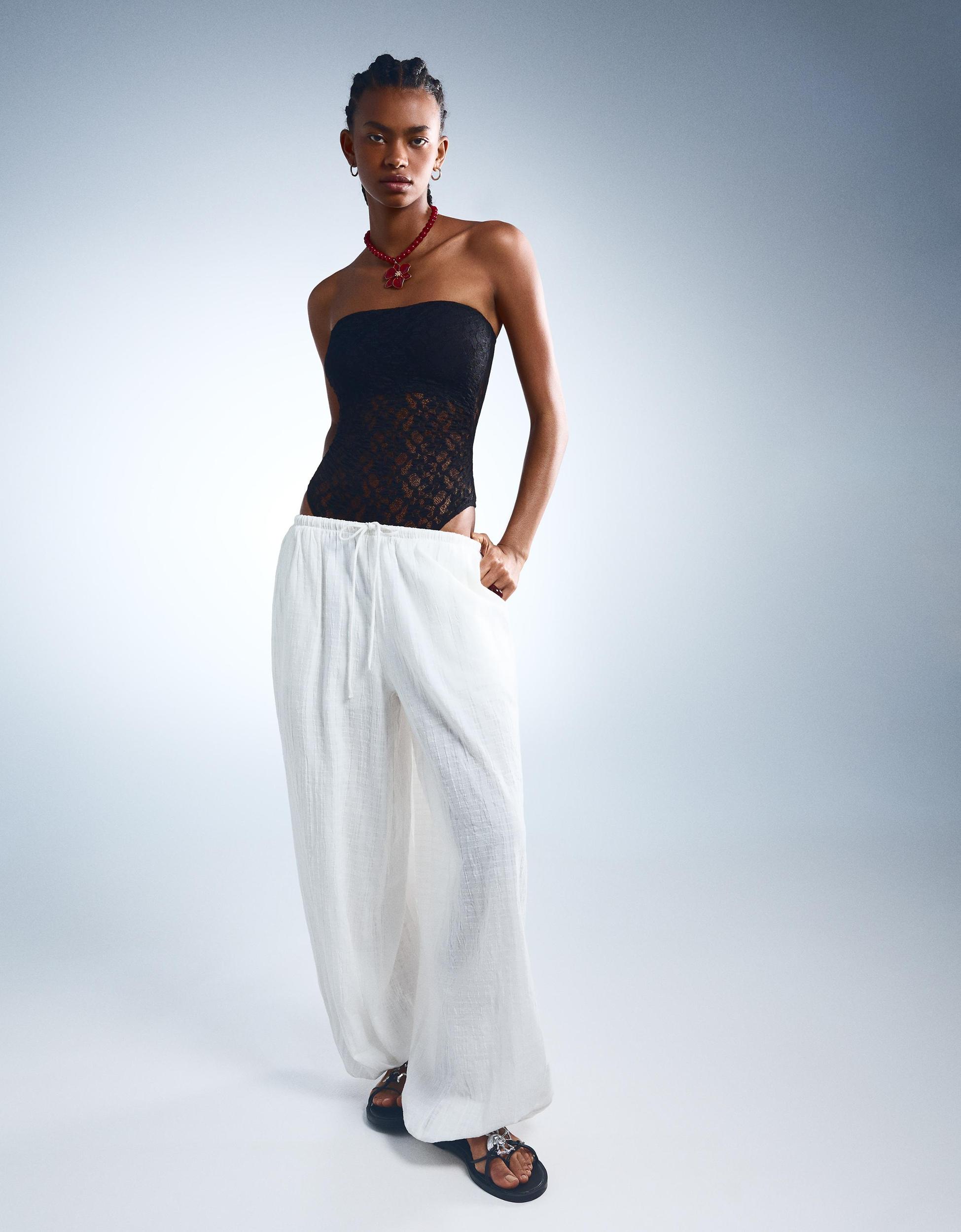 Bandeau bodysuit with blonde lace Product Image