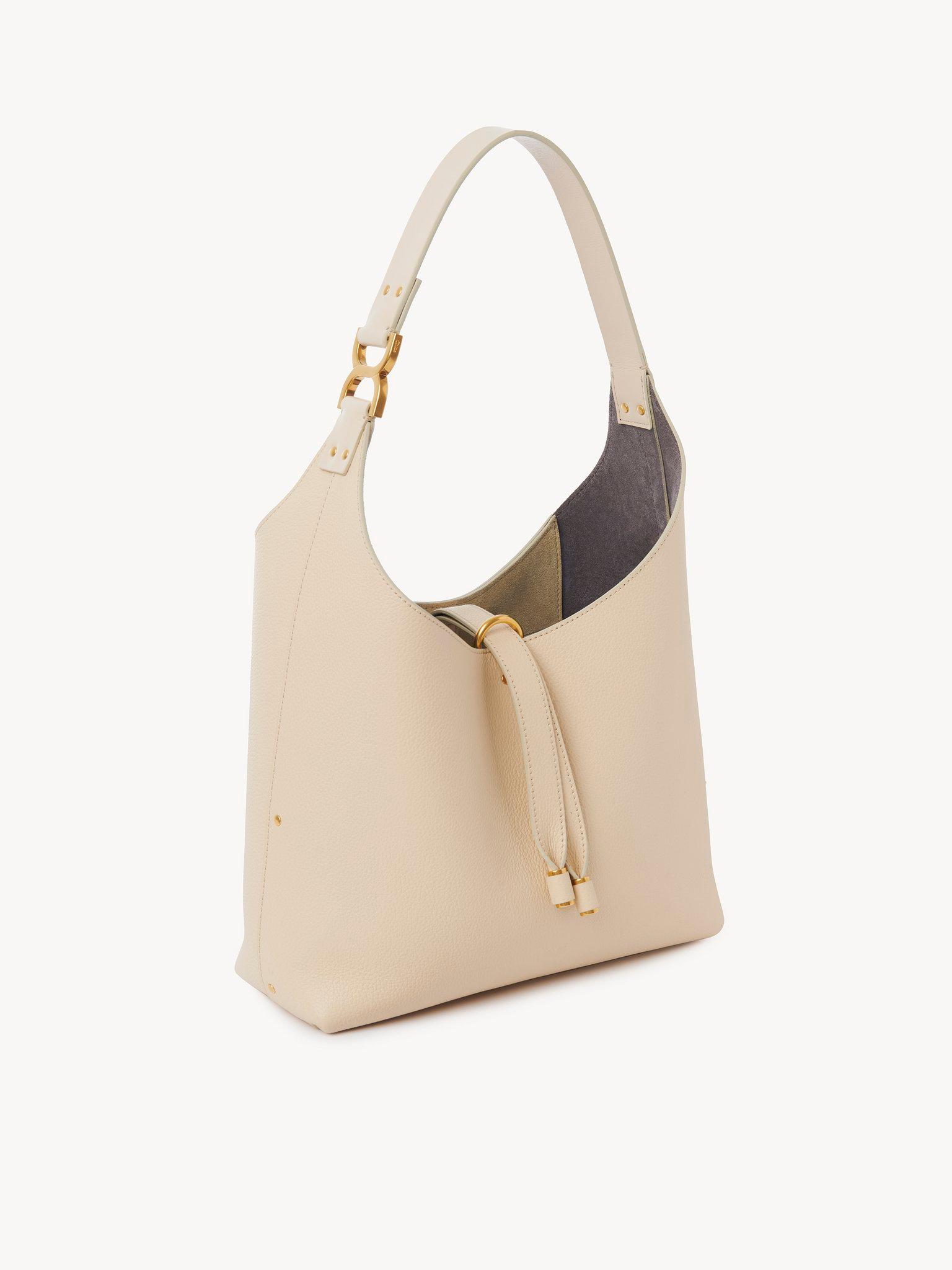 Small Marcie hobo bag in grained leather Product Image