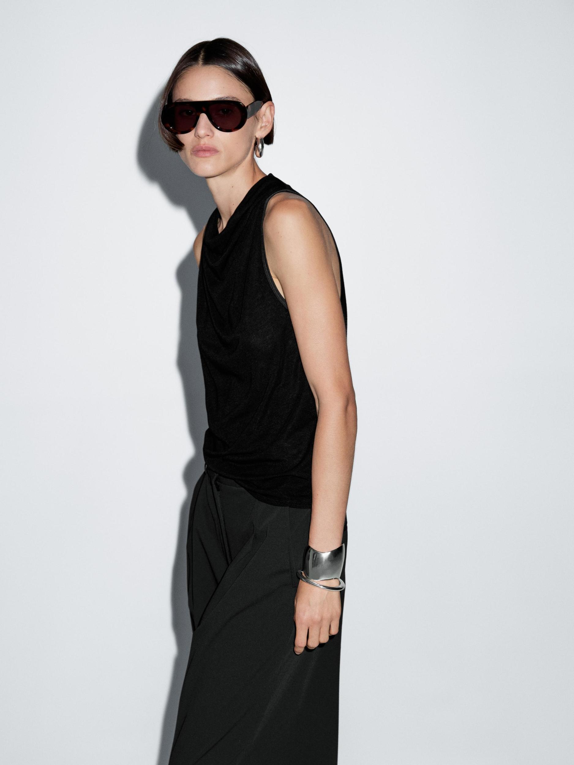 Sleeveless top with draped neckline Product Image