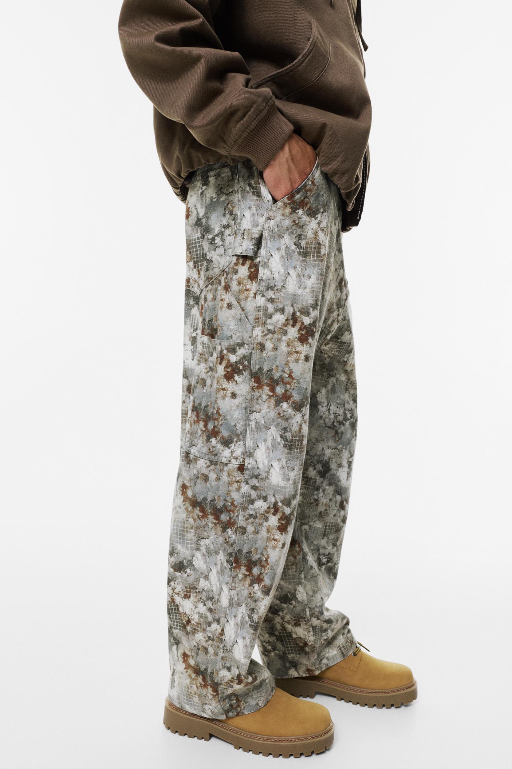 Camouflage print carpenter jeans Product Image
