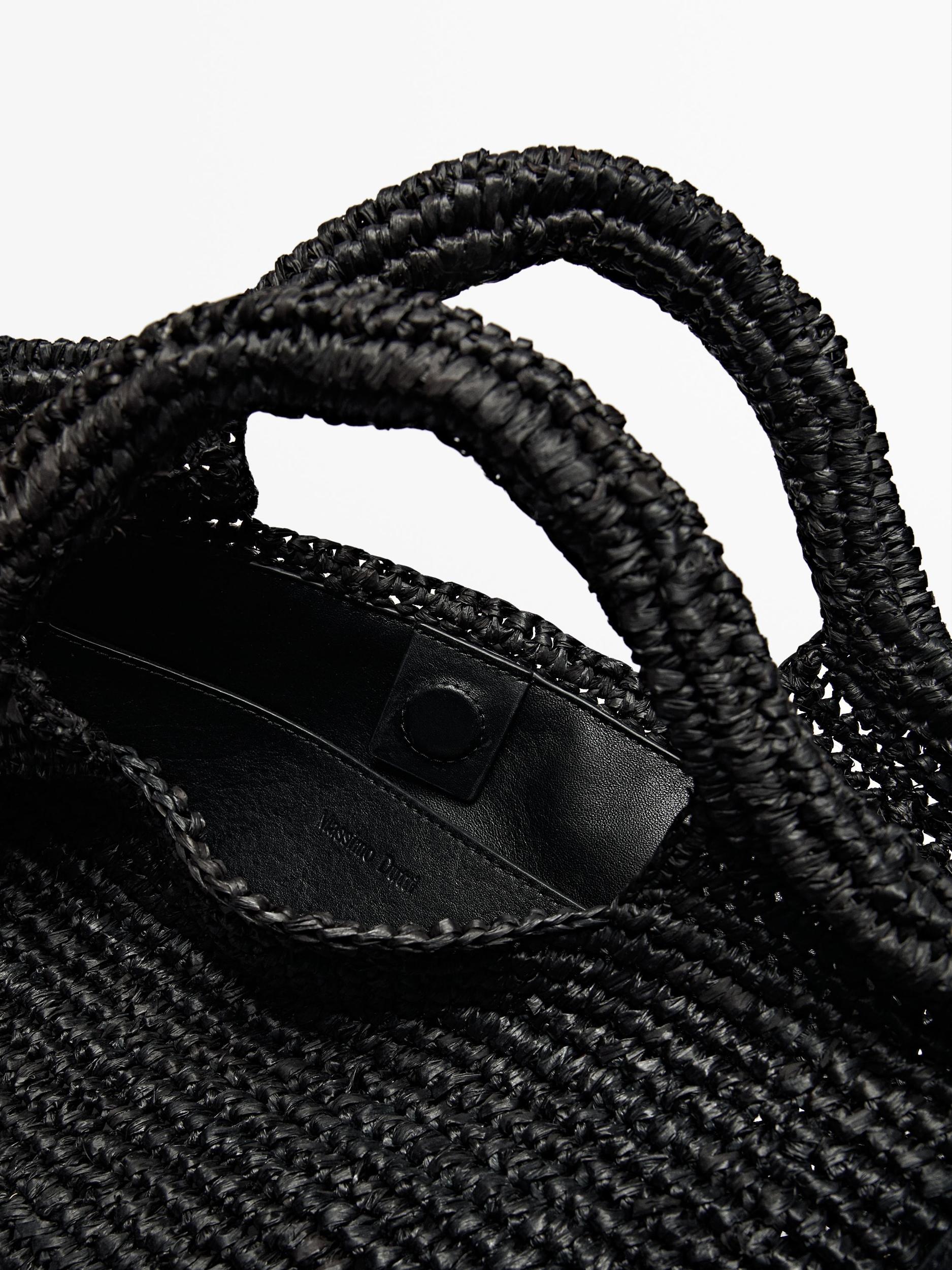 Natural raffia bag with leather base Product Image