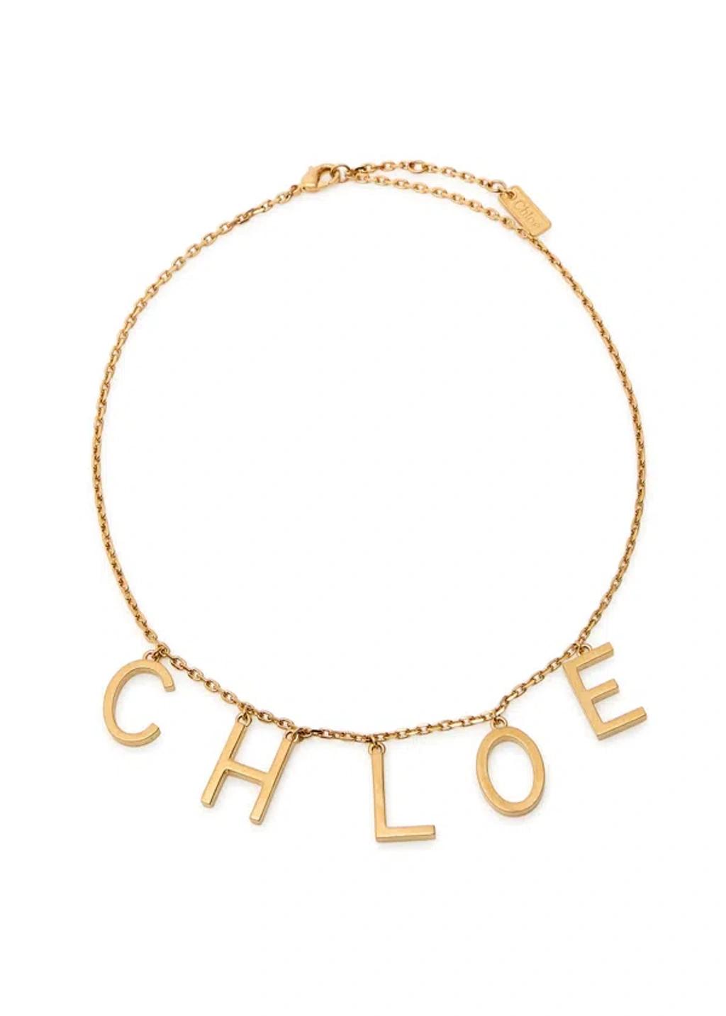 CHLOÉ Metallic Belt With Adjustable Hook Closure And Logo Lettering Charm In Brass Woman In Gold Product Image