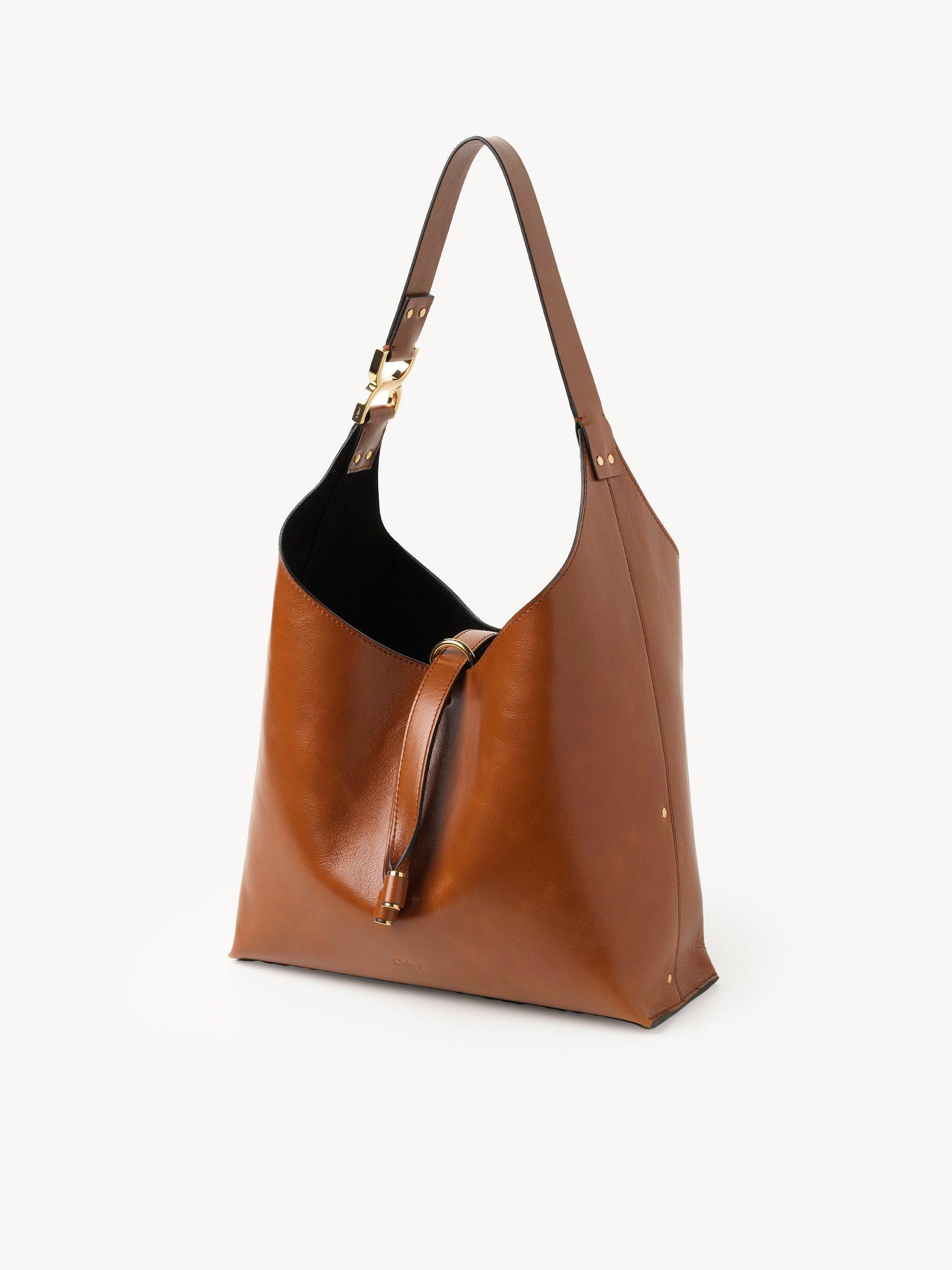 Small Marcie hobo bag in shiny leather Product Image