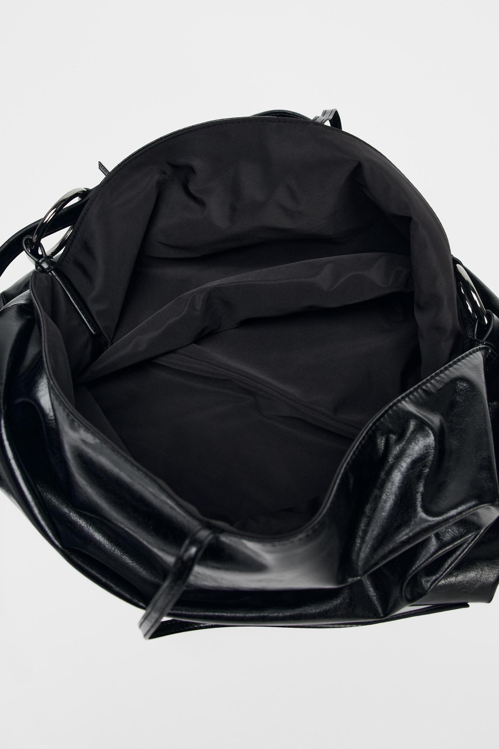 REVERSIBLE SLOUCHY BUCKET BAG Product Image
