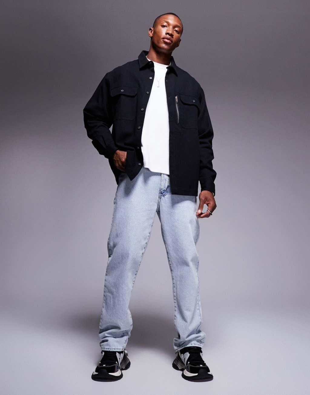 ASOS DESIGN oversized boxy shirt with patch pockets in black Product Image