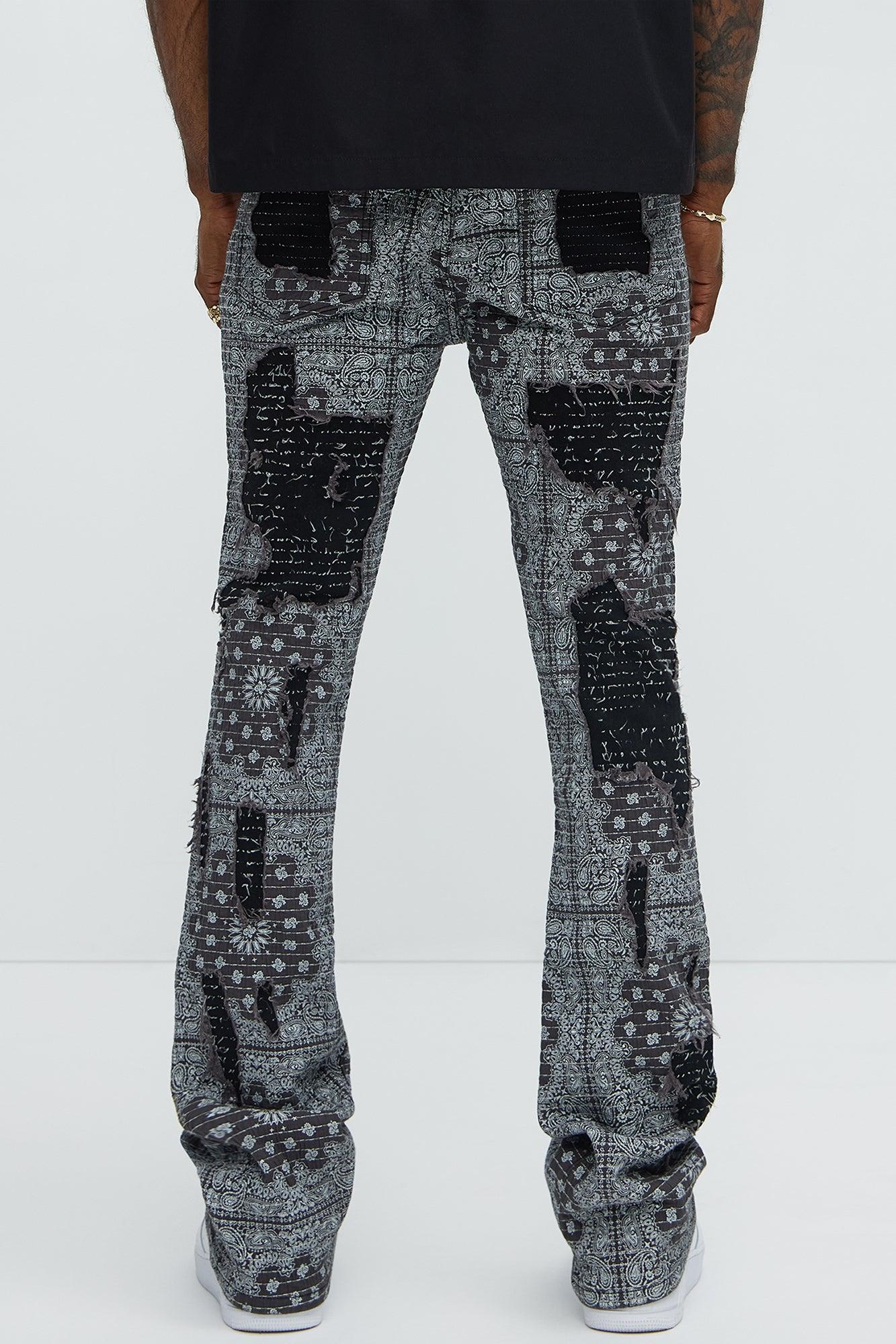 Shredded Shock Distressed Stacked Skinny Flare Jeans - Black Product Image