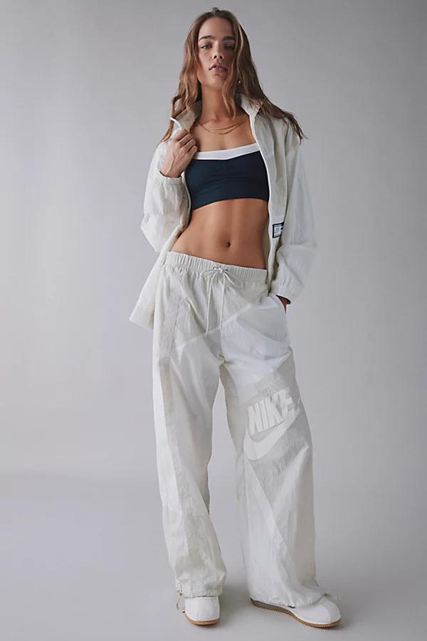 Nike Womens Sportswear Street Mid-Rise Loose Woven Open-Hem Pants in Sail/Light Orewood Brown/Light Orewood Brown Product Image