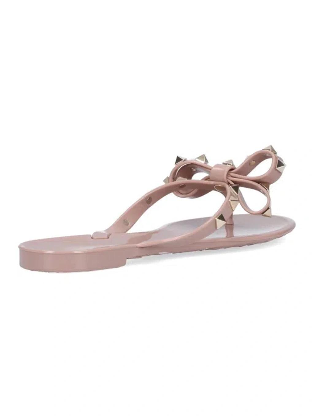 VALENTINO GARAVANI Women Rockstud Rubber Flip Flops In Beige Product Image