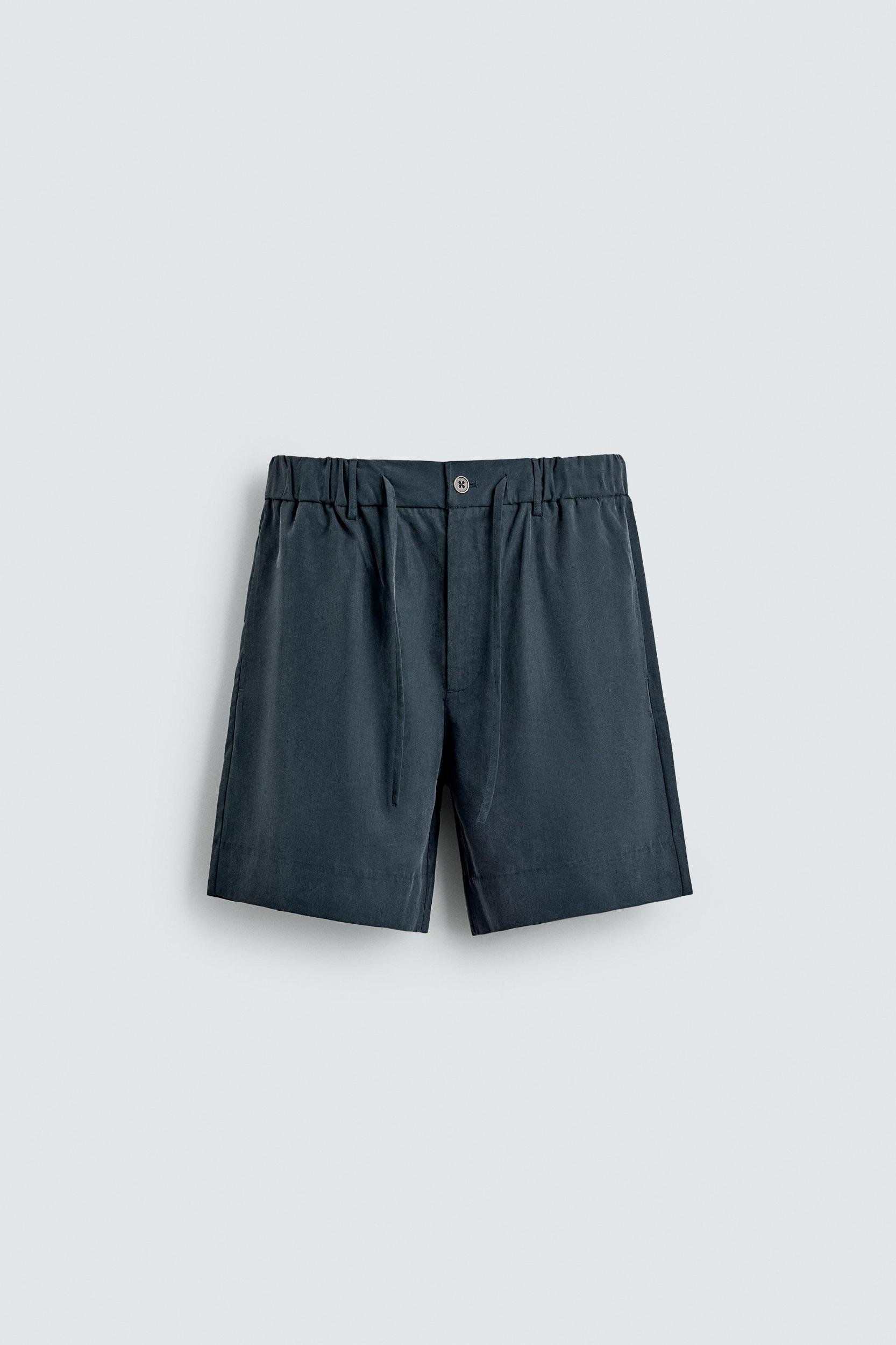 WASHED EFFECT RELAXED FIT SHORTS Product Image