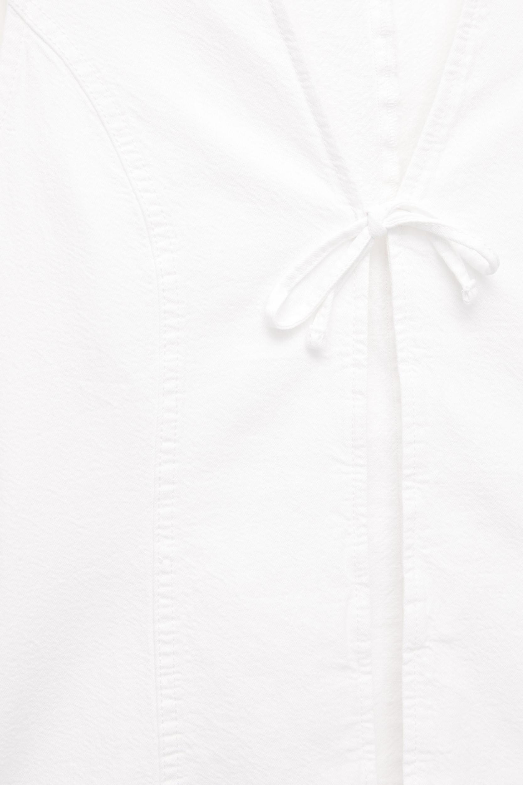 Blouse with tie fastening Product Image