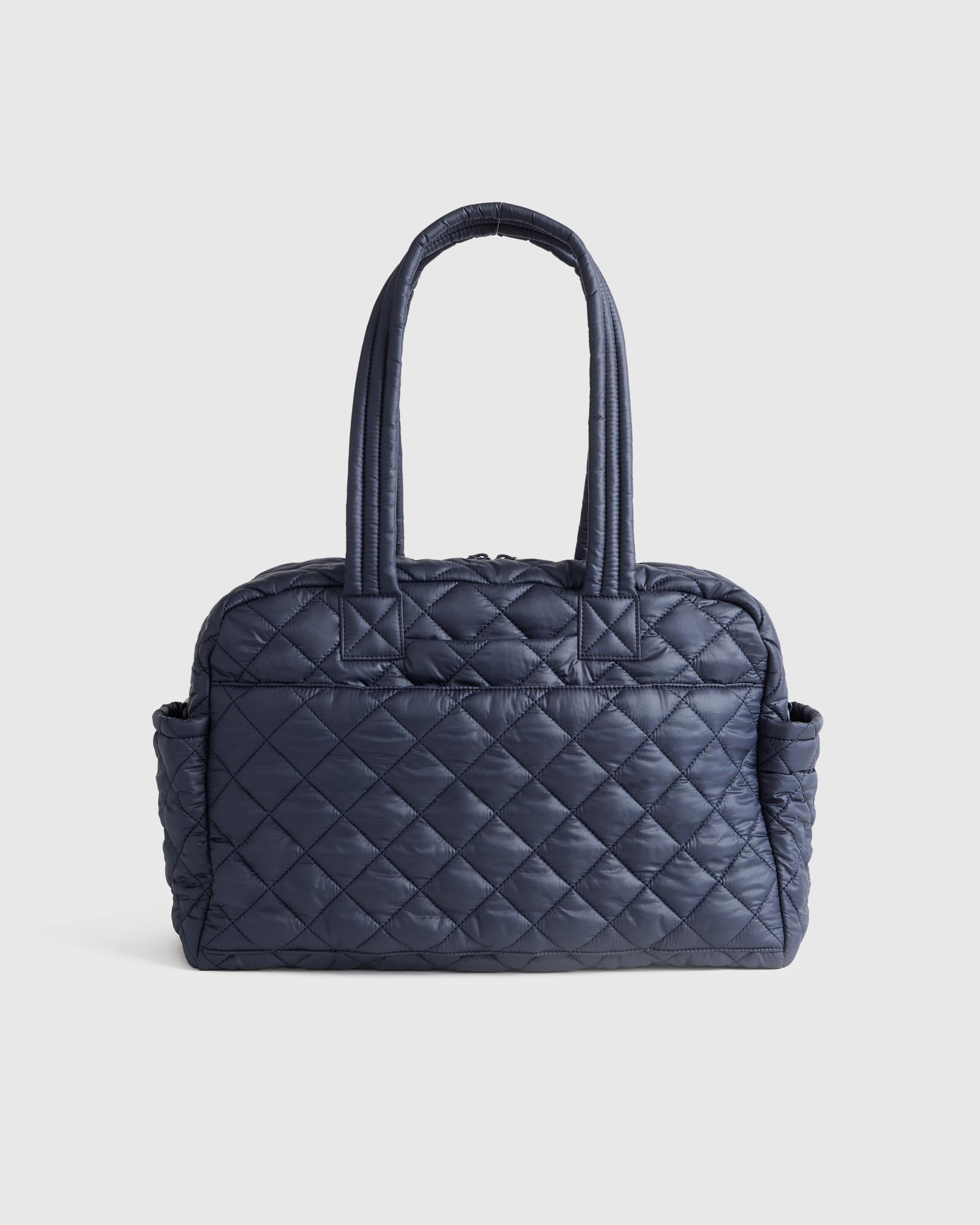 Quince | Women's Transit Quilted Duffle Bag in Navy, Nylon Product Image