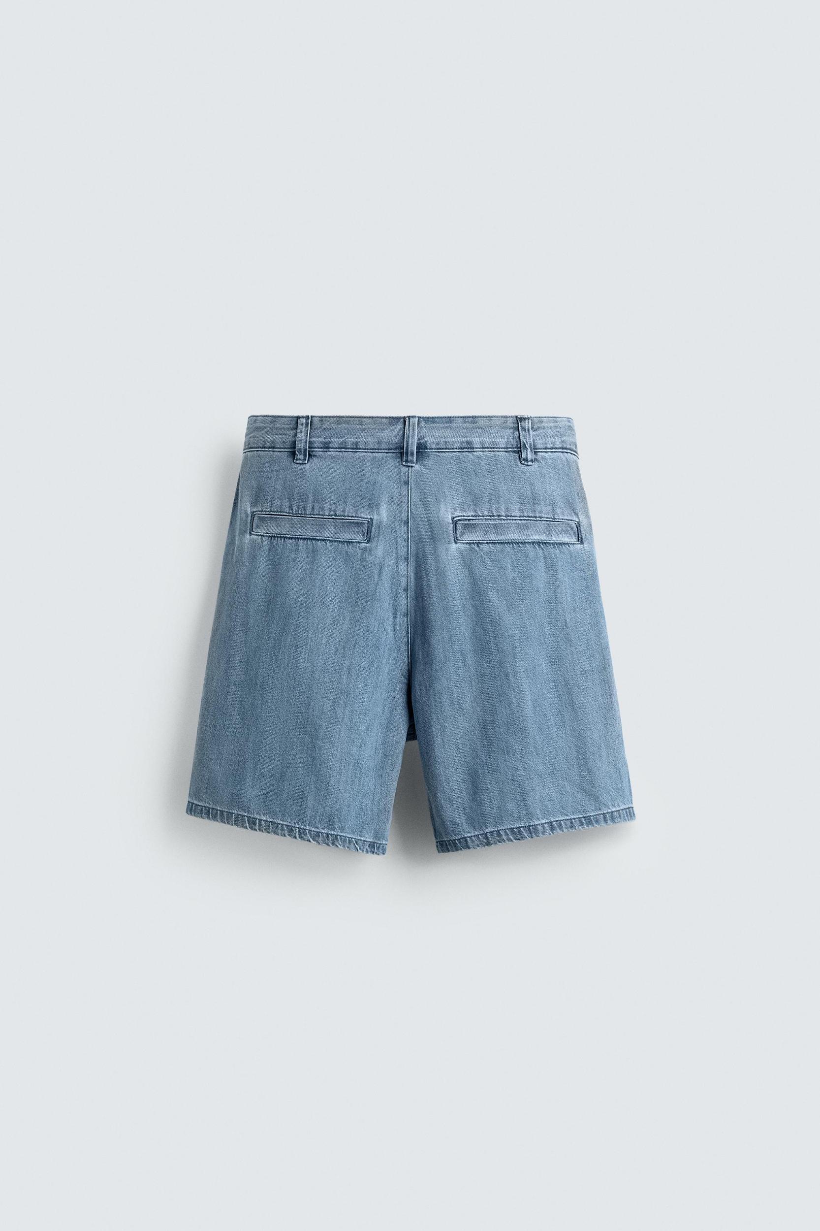 RELAXED FIT PLEATED DENIM SHORTS Product Image