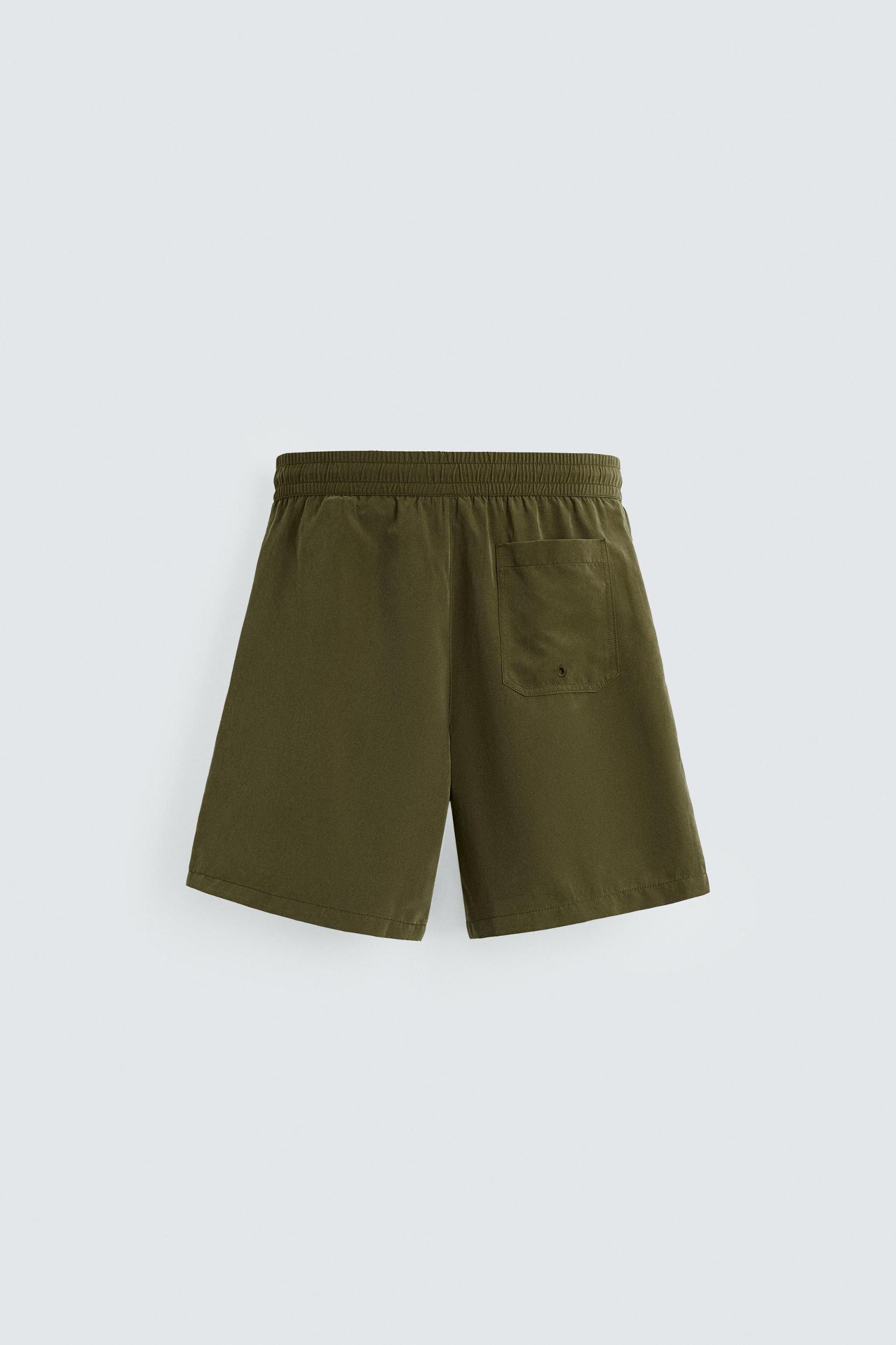BASIC LONG SWIM TRUNKS Product Image