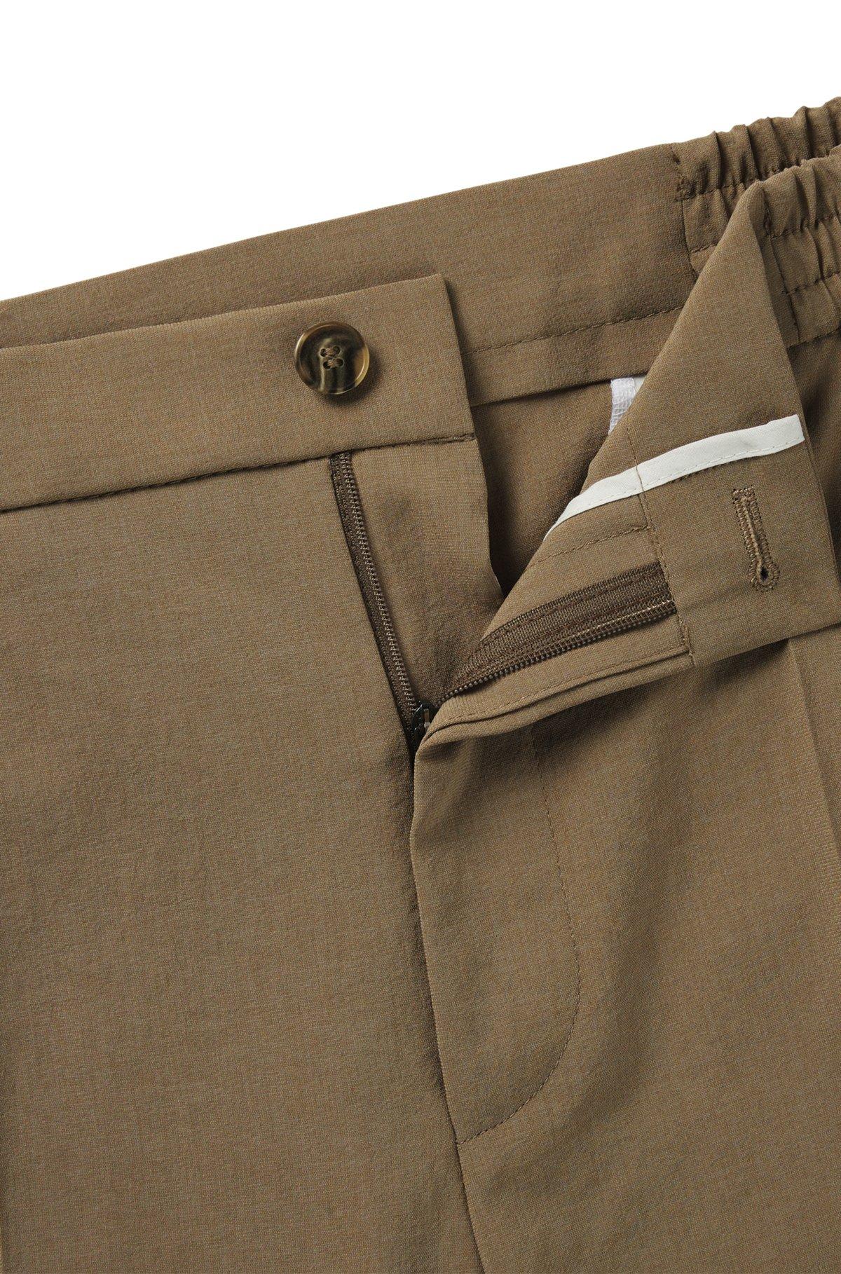 Slim-fit trousers in melange wrinkle-resistant fabric Product Image