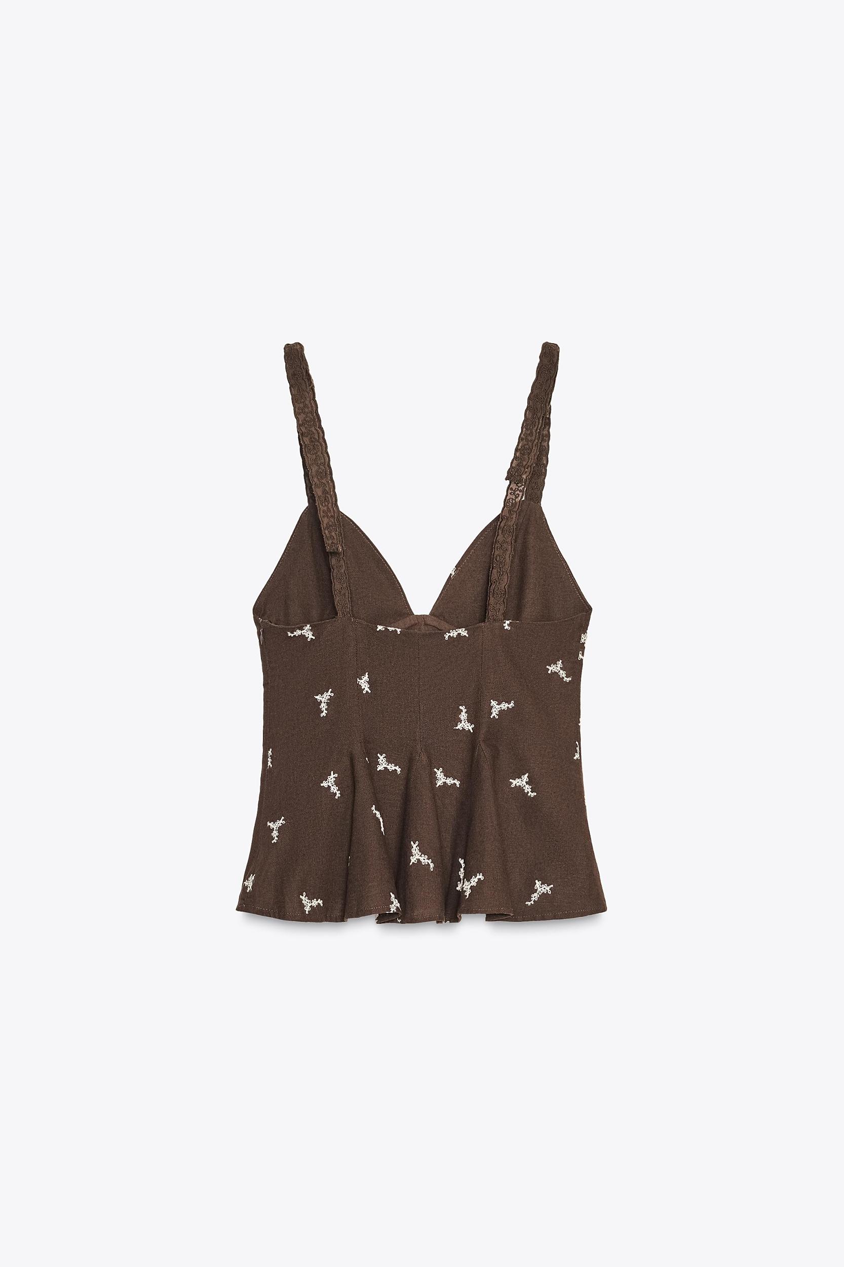 EMBROIDERED PEPLUM TOP Product Image