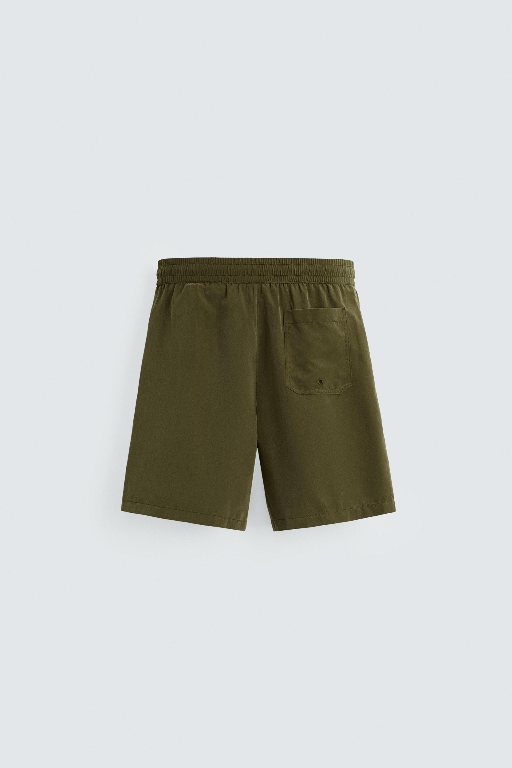 BASIC LONG SWIM TRUNKS Product Image