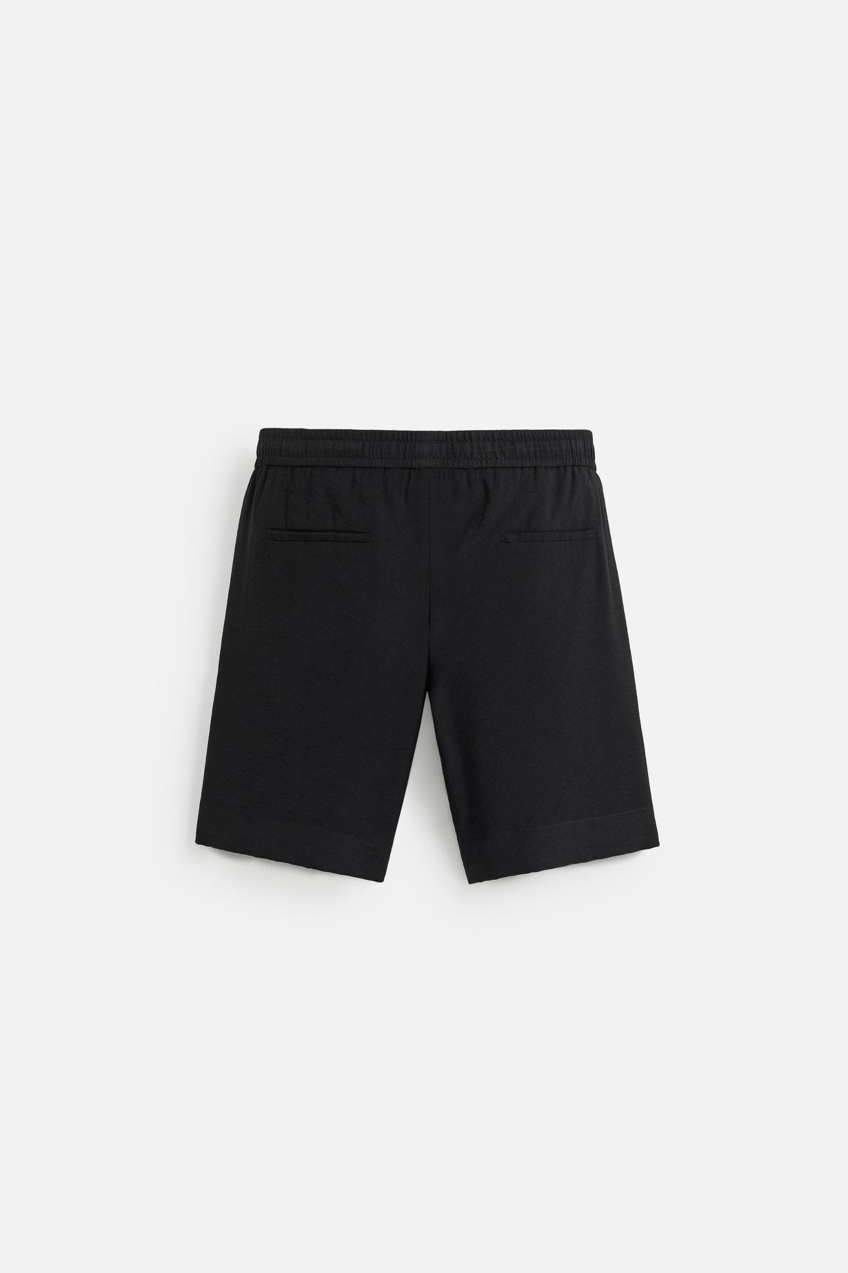 FLOWY RELAXED FIT BERMUDA SHORTS Product Image