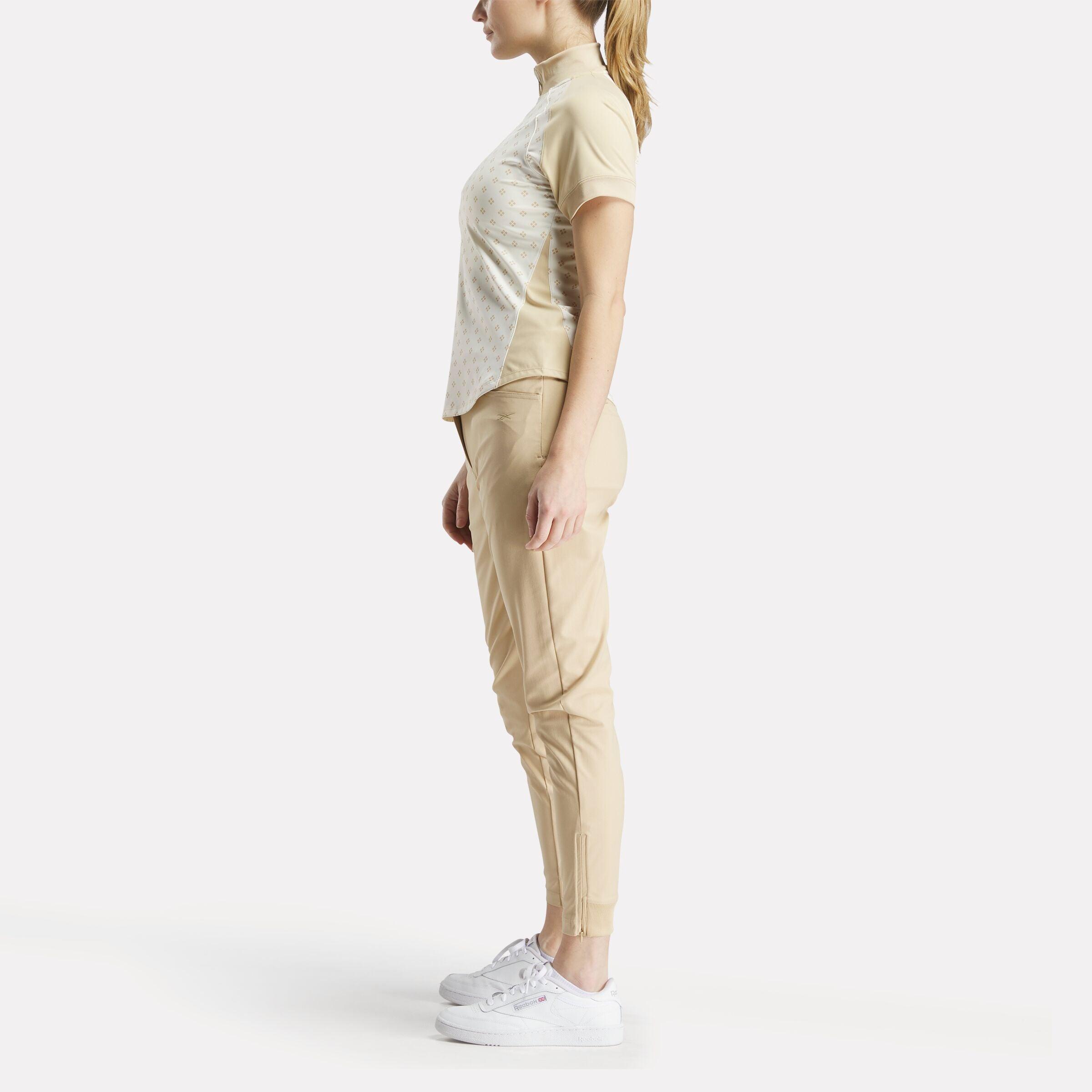 Women's Short Sleeve 1/4 Zip Mini Argyle Print Top Female Product Image