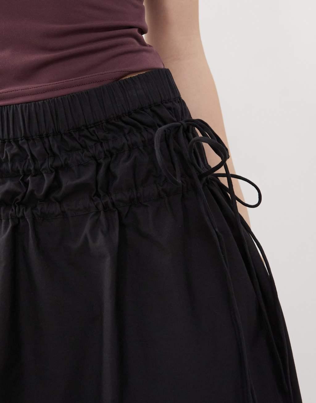 Reclaimed Vintage full poplin midi skirt with tie sides in black Product Image