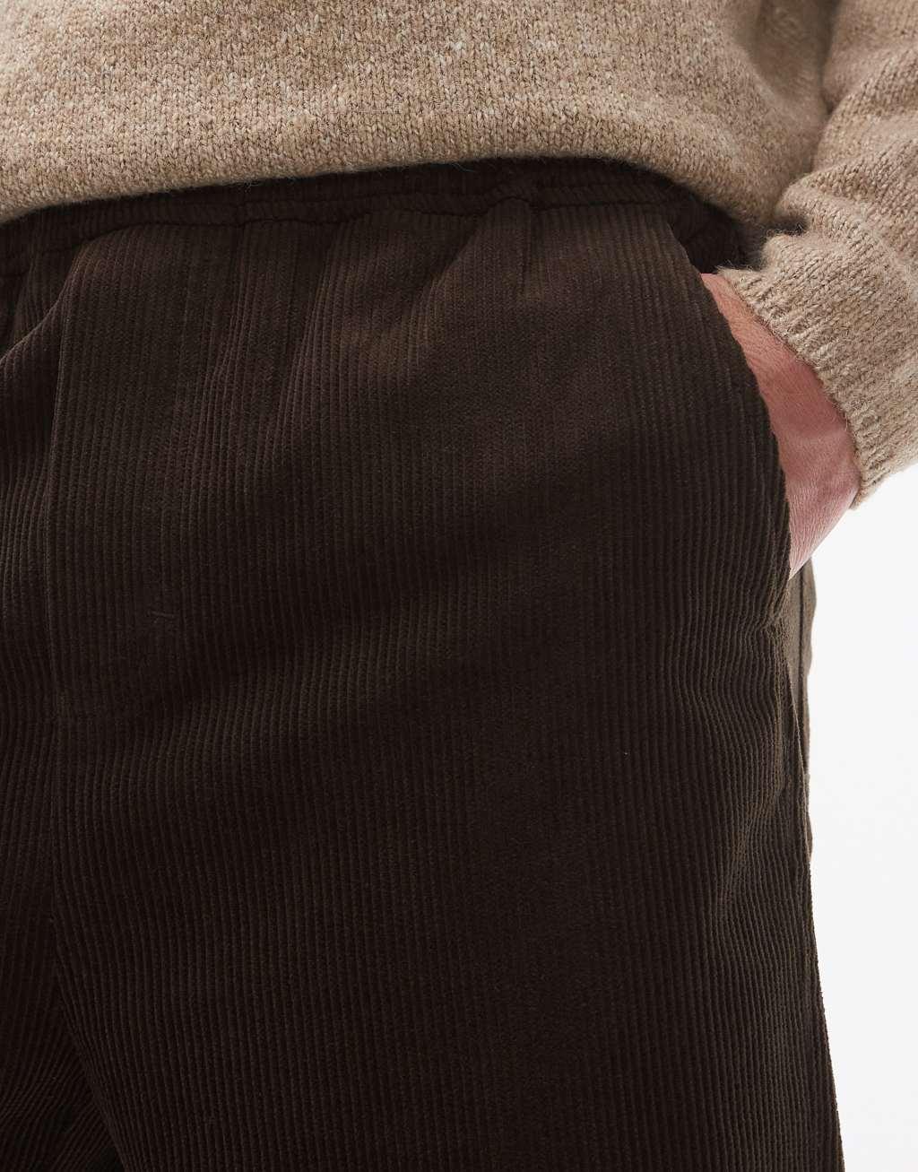 Topman tapered cord pants in brown Product Image