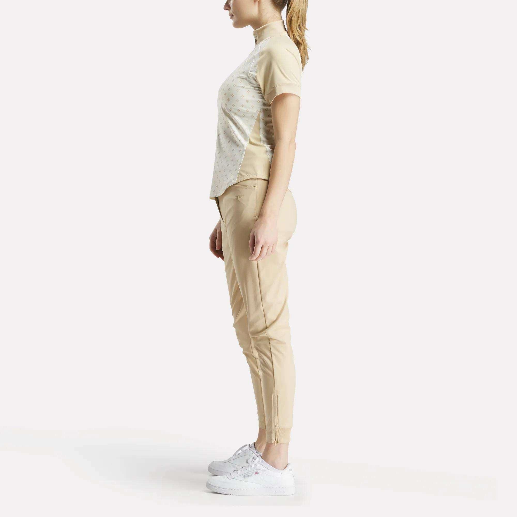 Women's Short Sleeve 1/4 Zip Mini Argyle Print Top Female Product Image