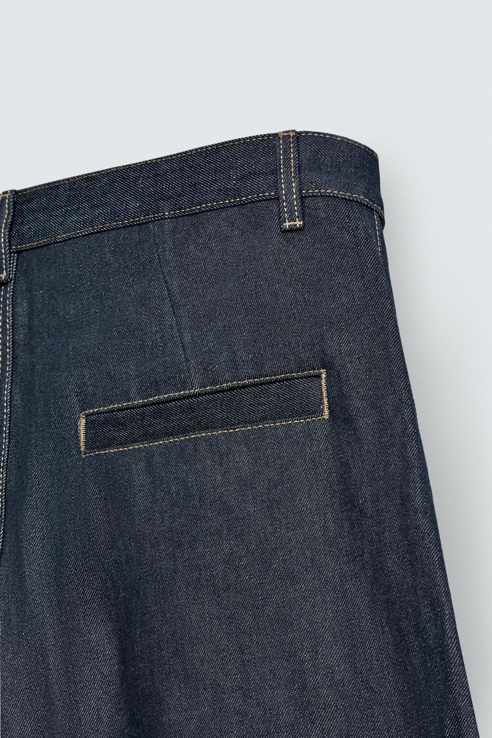 RELAXED FIT PLEATED DENIM SHORTS Product Image