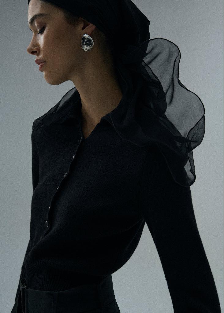 Long-sleeve buttoned cropped sweater in black Product Image