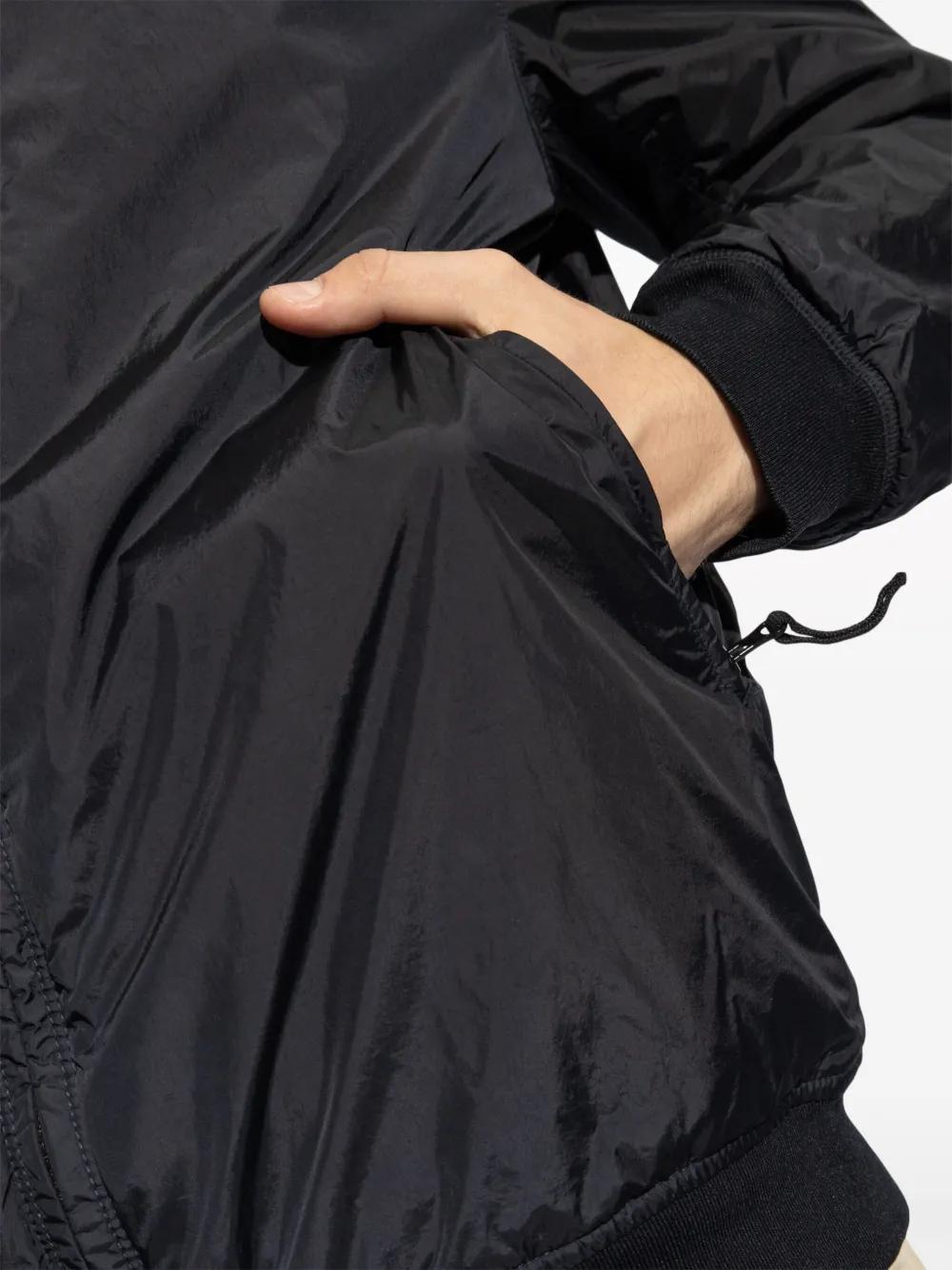 Compass-badge hooded windbreaker Product Image