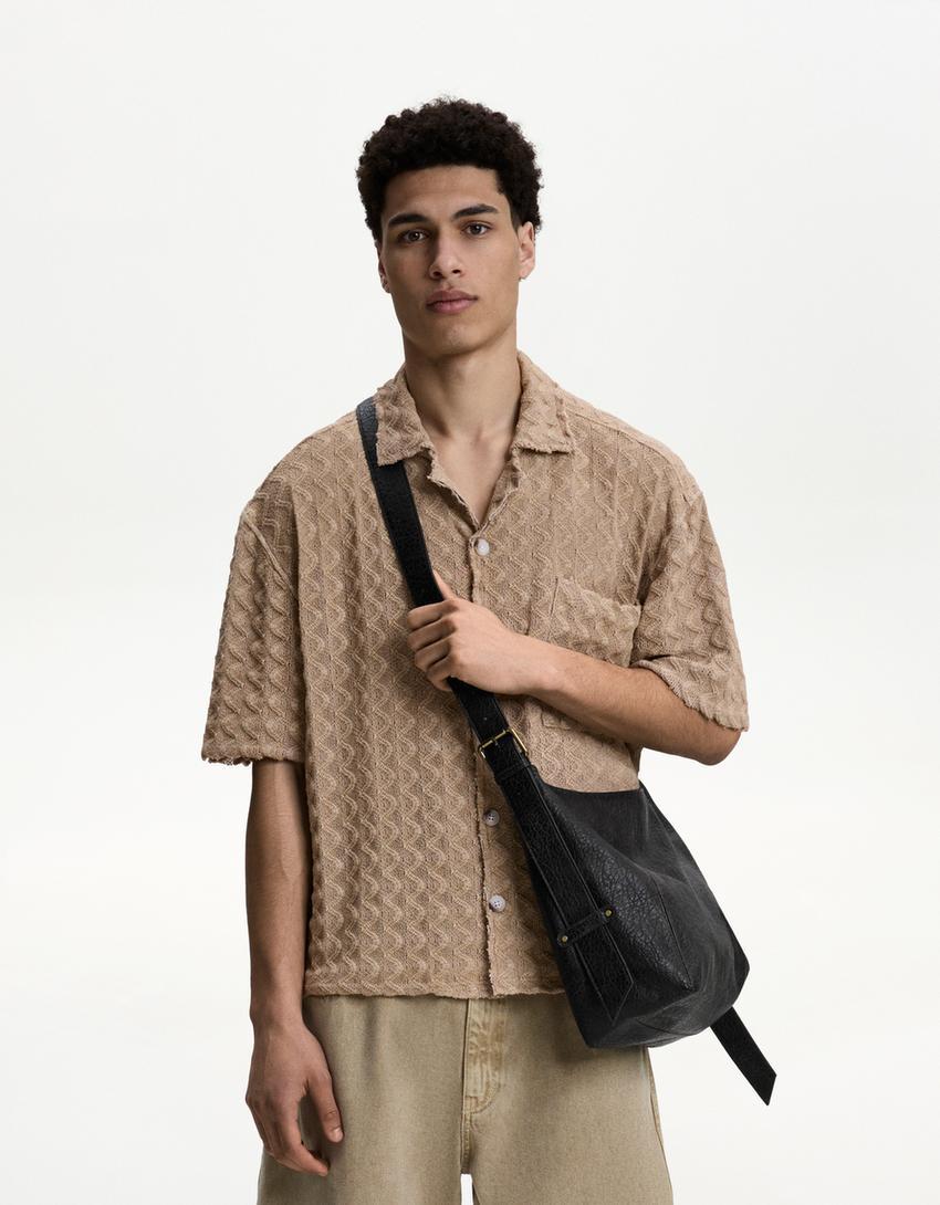 Leather effect crossover bag Product Image