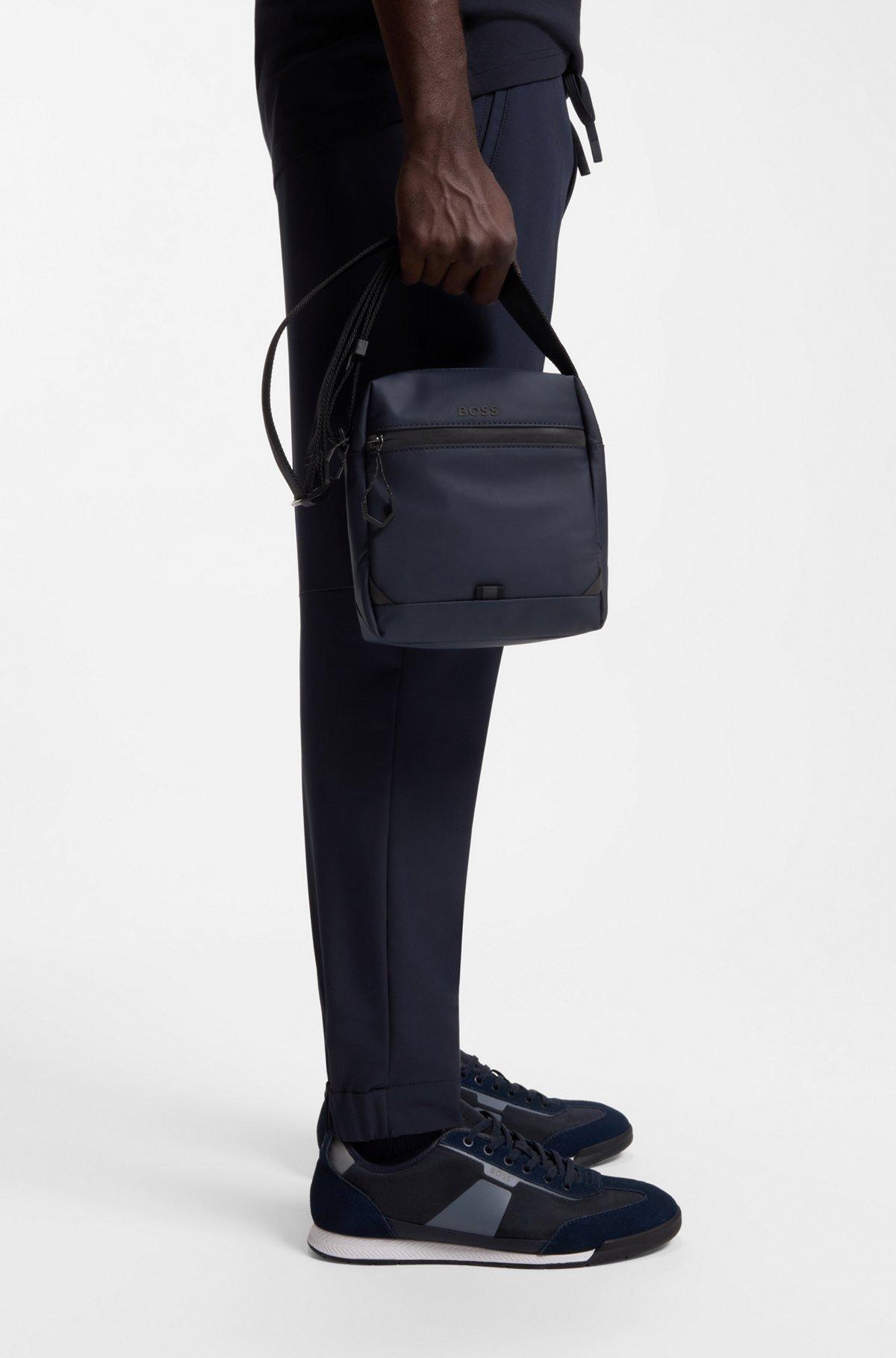 Reflective-detail reporter bag in faux leather Product Image