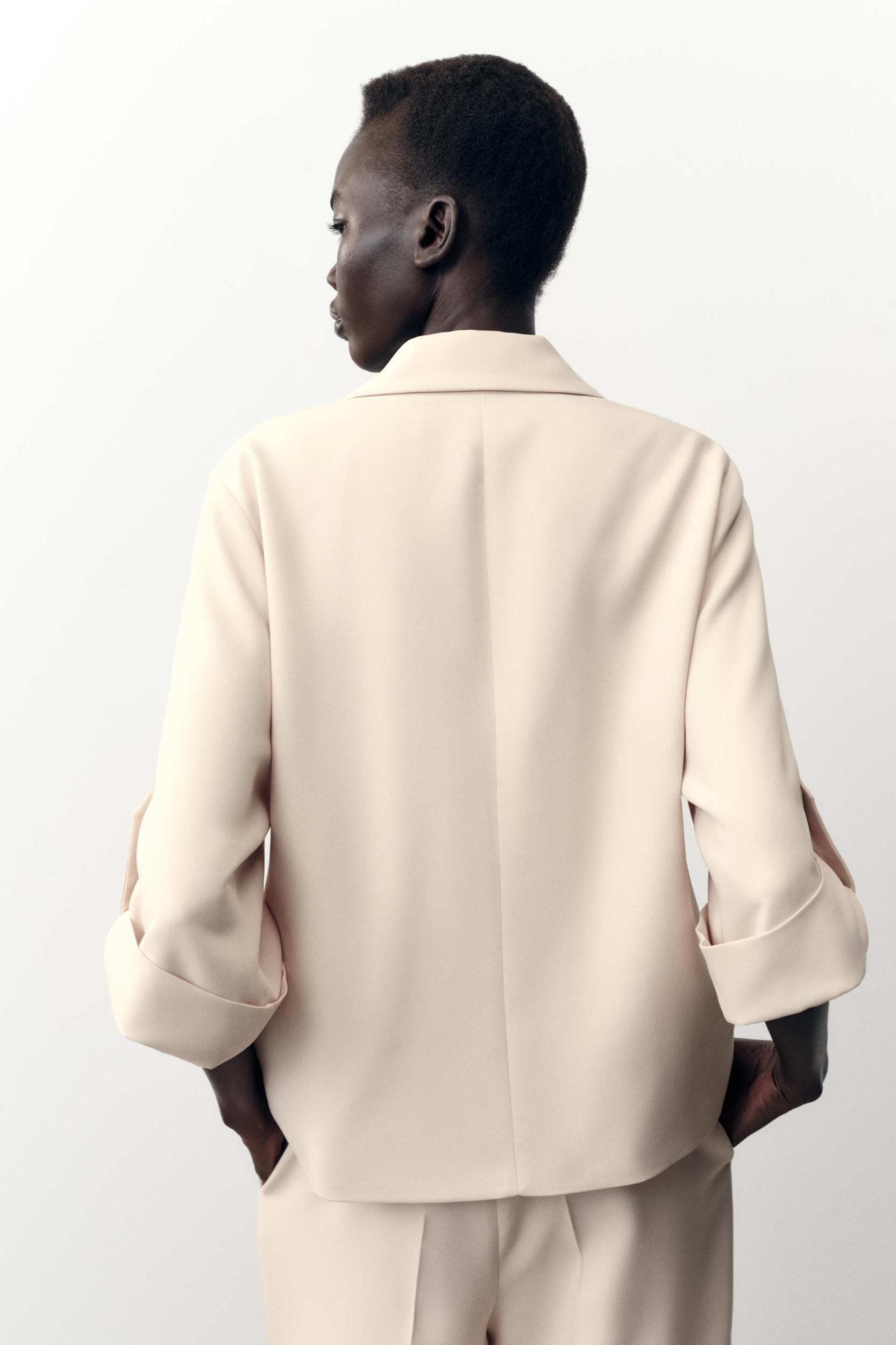 DOUBLE BREASTED BLAZER WITH TABBED SLEEVES Product Image