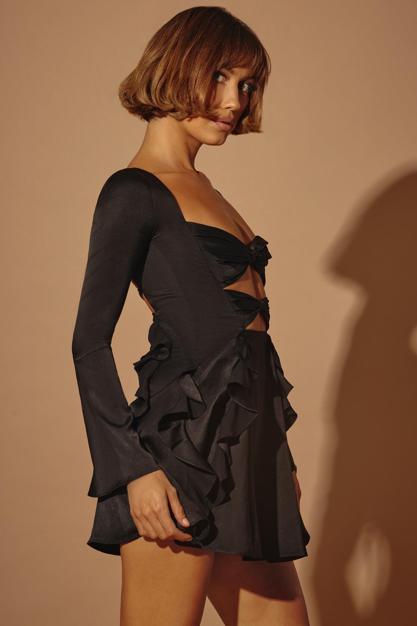 Long Sleeve Bow Mini Dress in Black Product Image