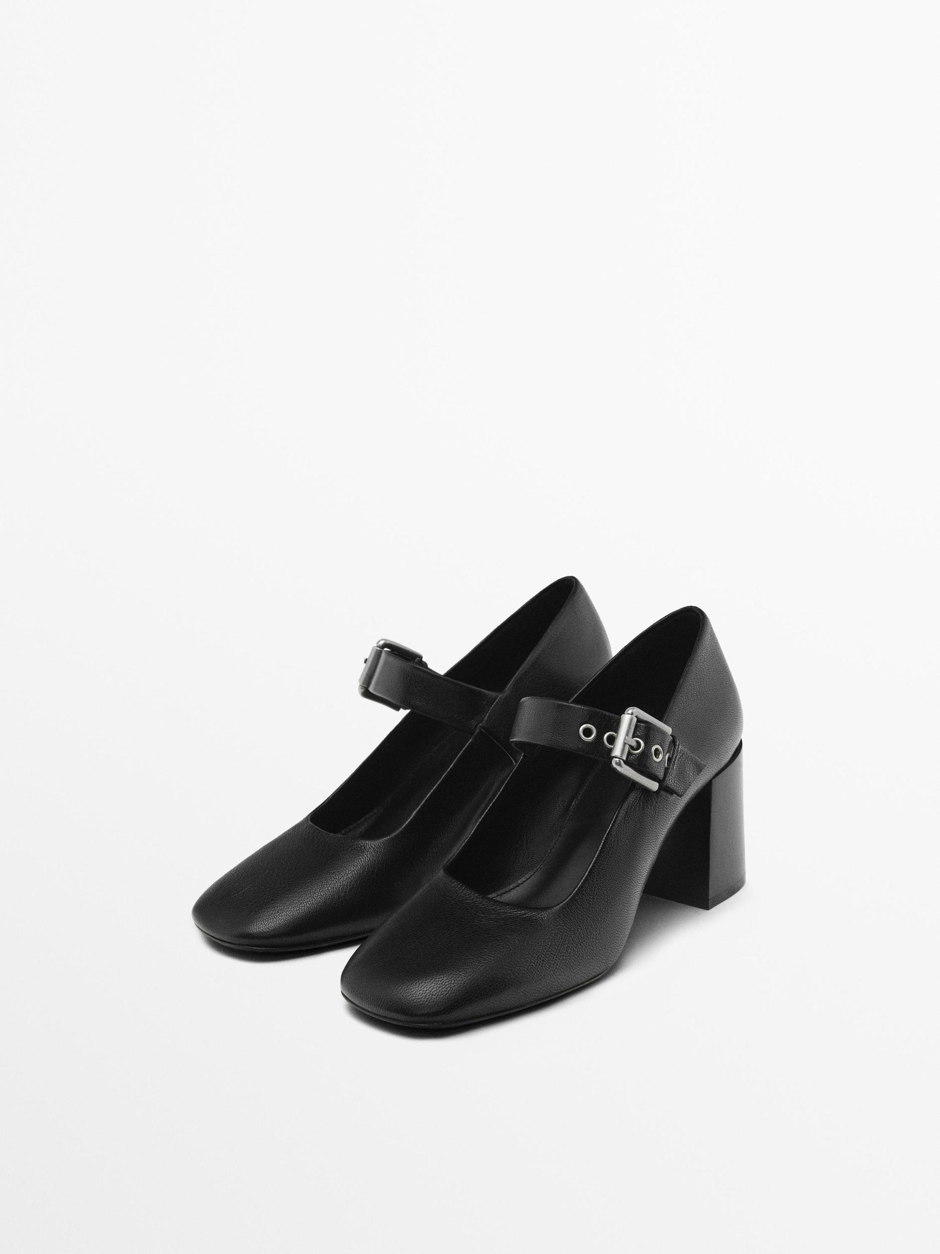 High-heel shoes with buckled strap Product Image