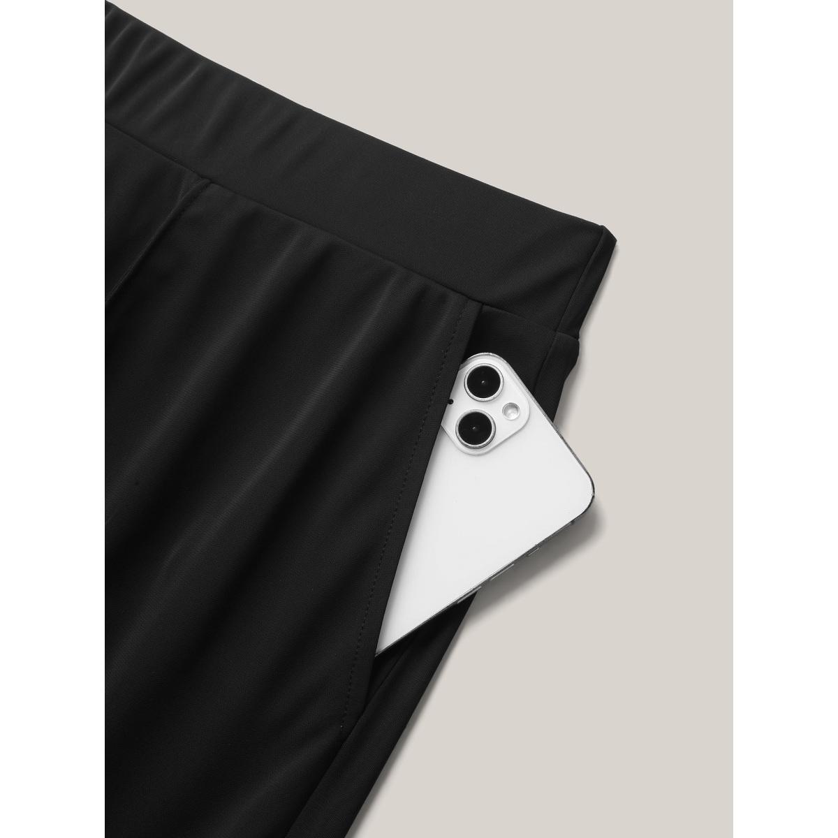 Plus Size Stretchy Pleated Pockets Wide-Leg Pants Women Black At the Office Wide Leg Mid Rise Work Pants BloomChic 10/M Product Image