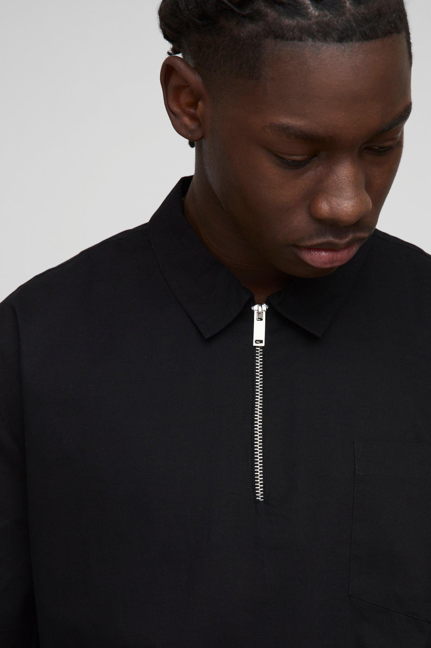 Black Oversized Boxy Quarter Zip Short Sleeve Shirt | boohooMAN USA Product Image