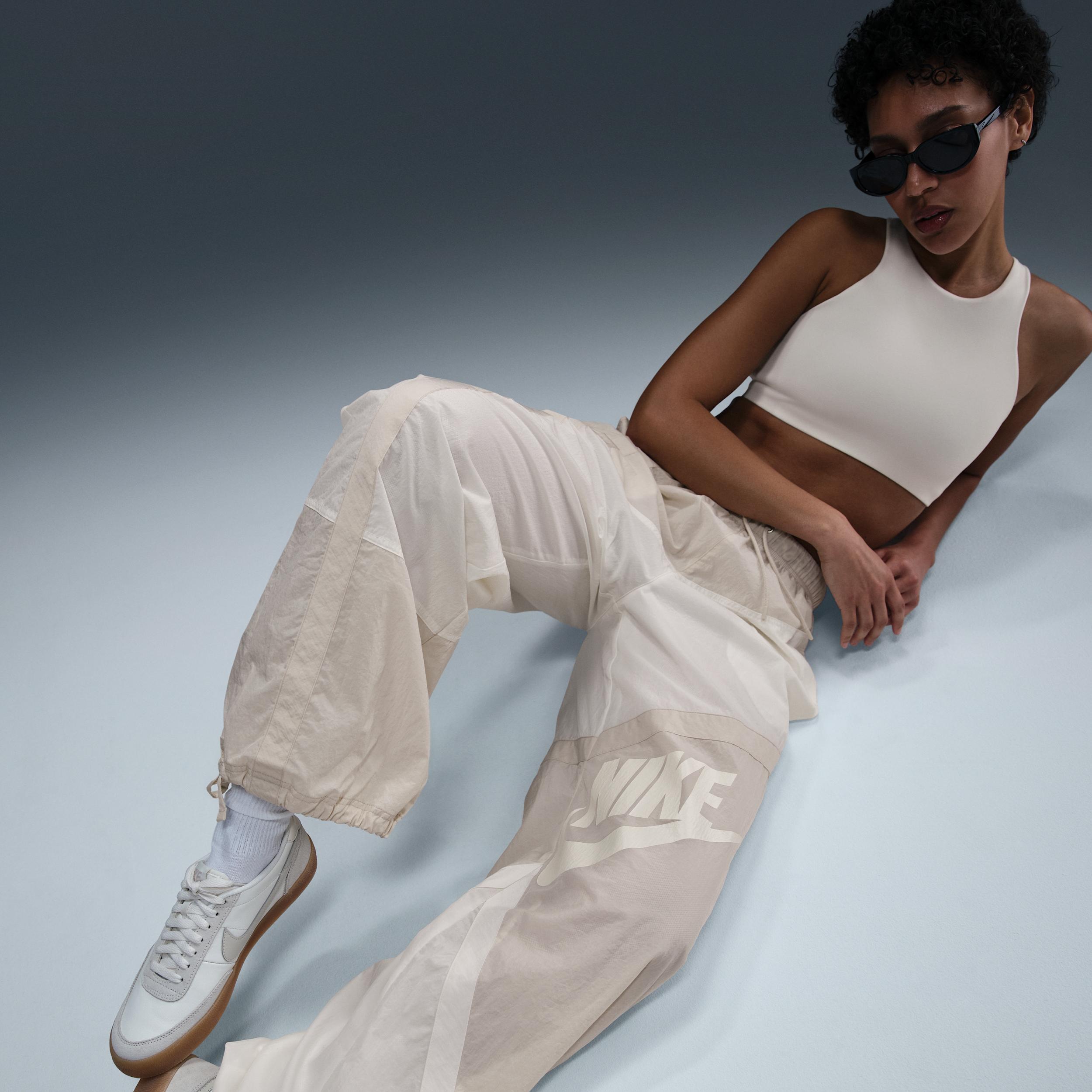 Nike Womens Sportswear Street Mid-Rise Loose Woven Open-Hem Pants in Sail/Light Orewood Brown/Light Orewood Brown Product Image