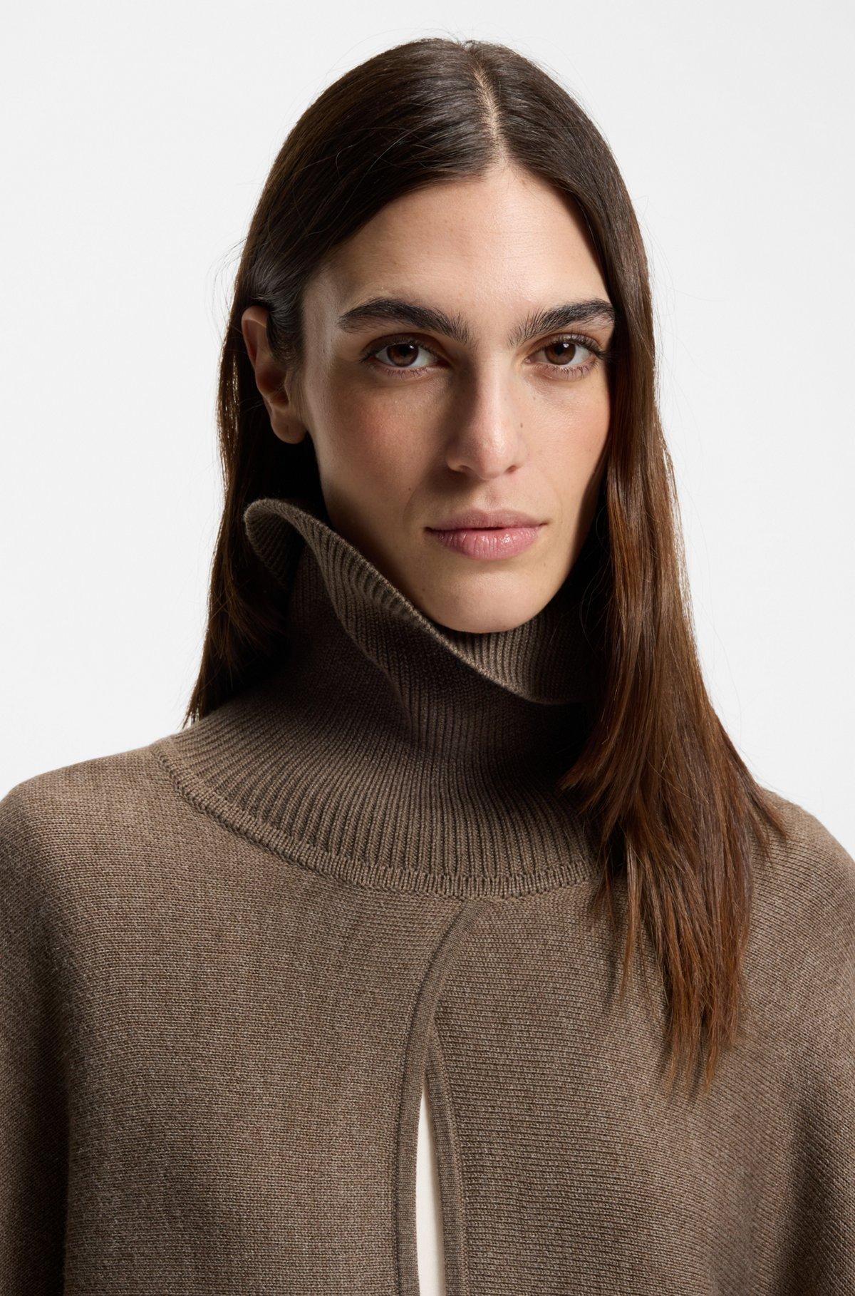 Rollneck poncho in a wool blend Product Image
