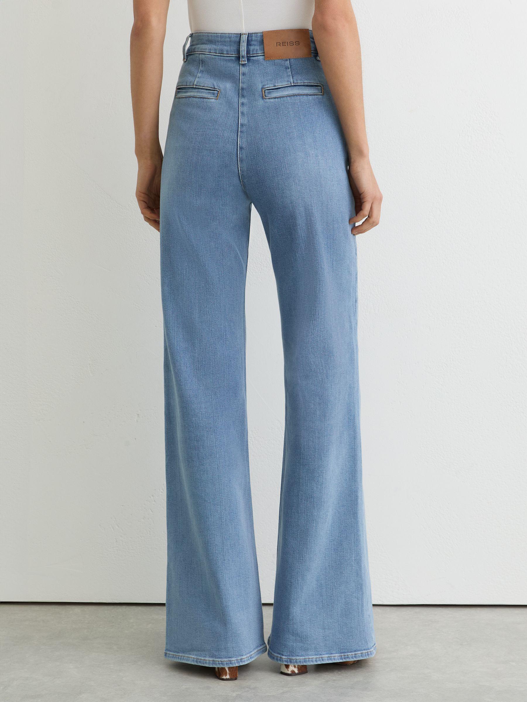 Petite Slim-Leg Mid-Rise Jeans in Mid Blue Product Image