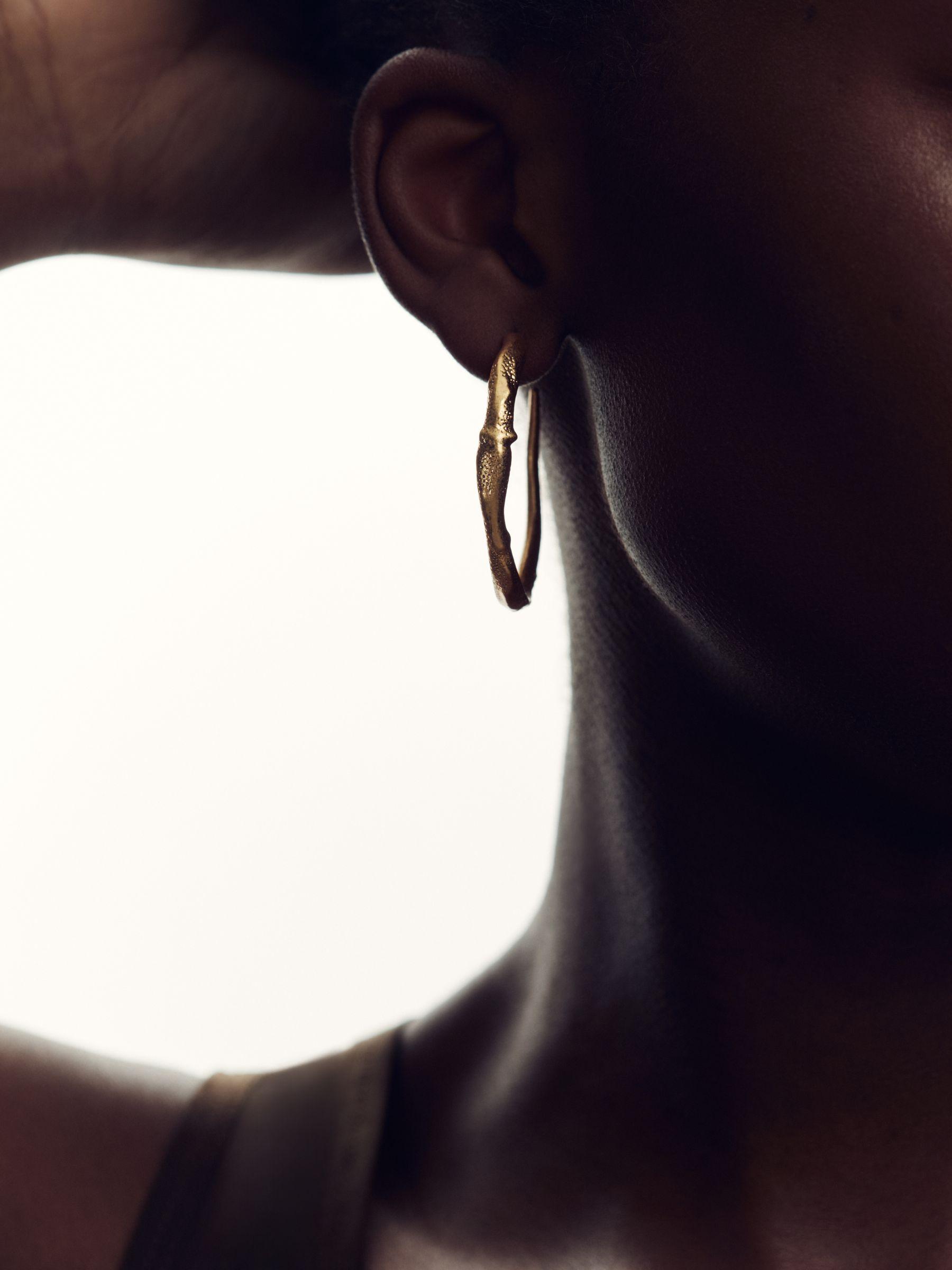 Molten Hoop Earrings in Gold Tone Product Image