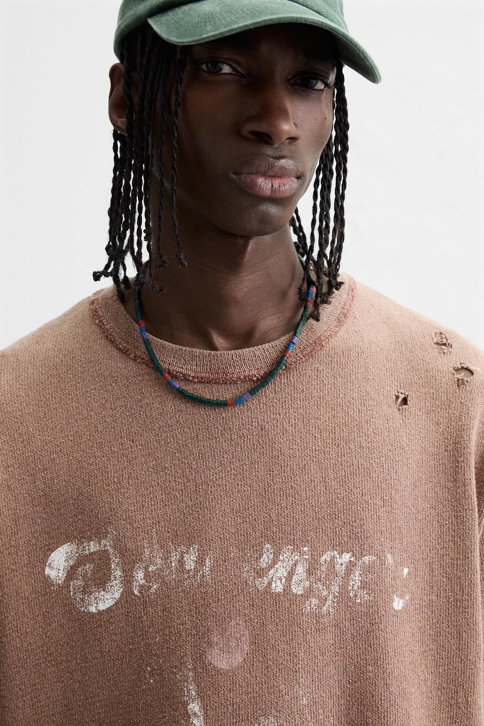 CONTRAST PRINT KNIT T-SHIRT Product Image