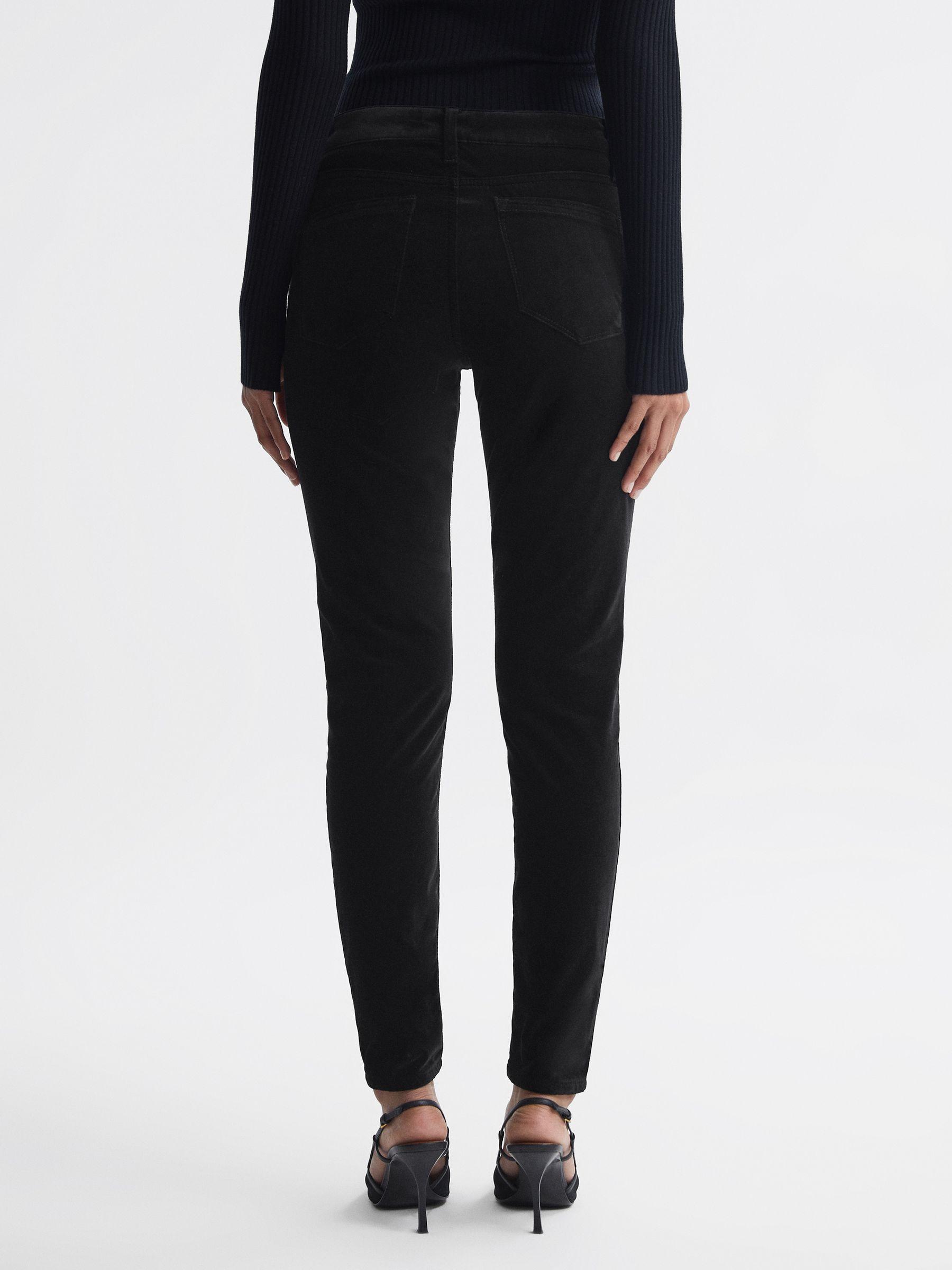 Velvet Mid Rise Skinny Jeans in Black Product Image
