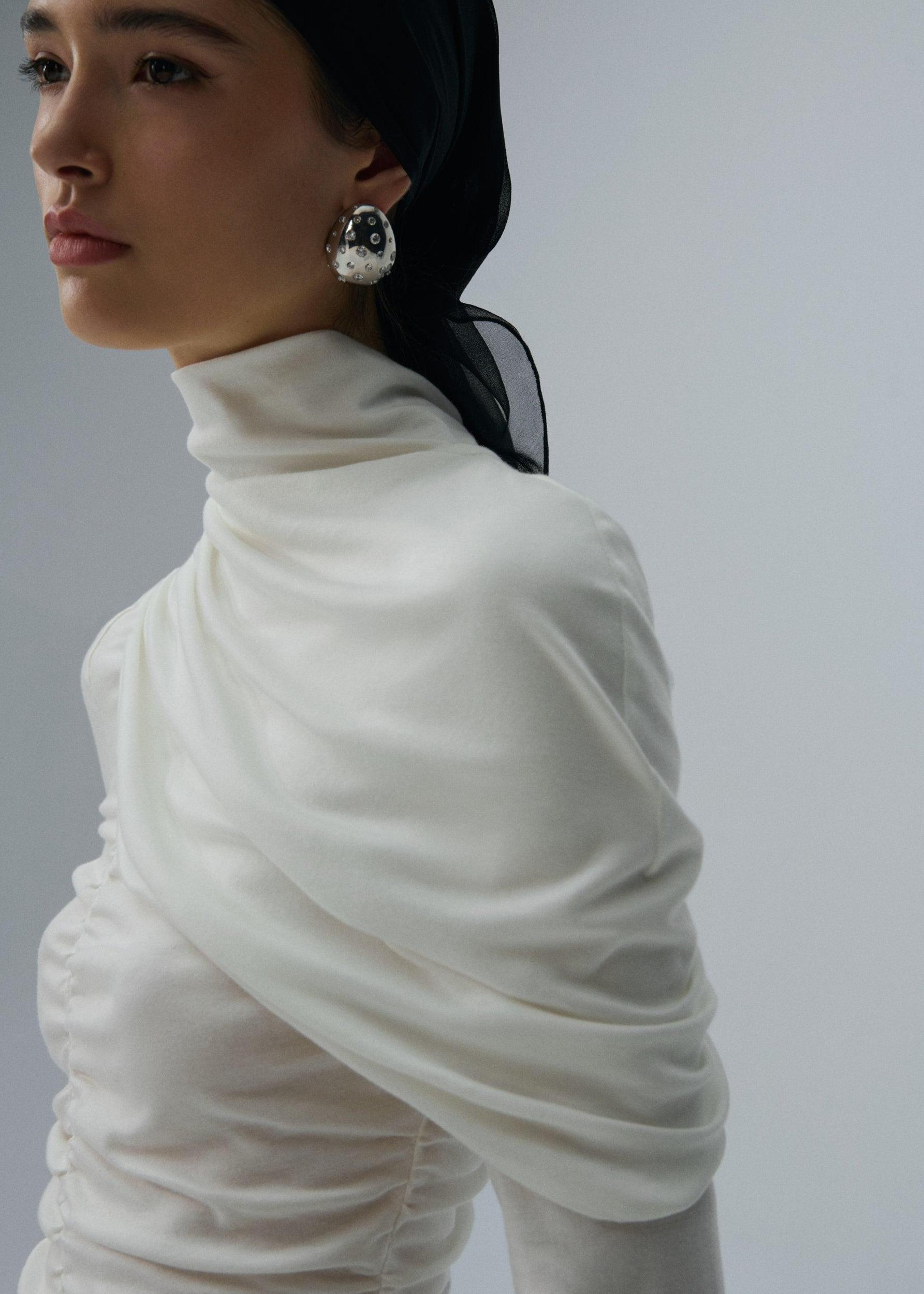 Draped high neck blouse in cream Product Image