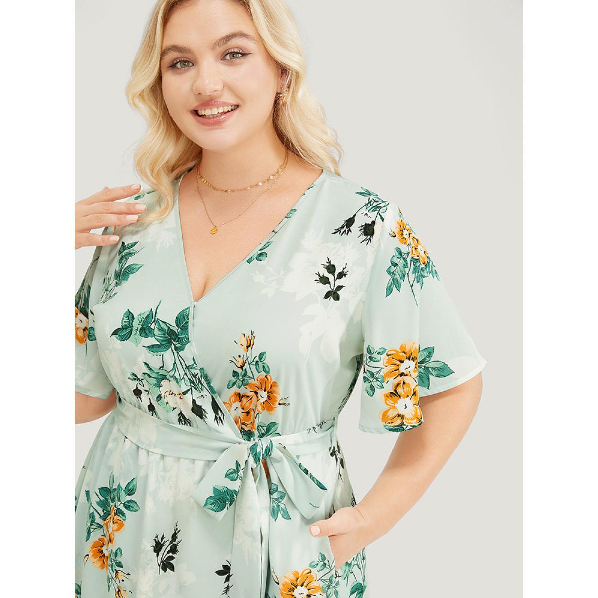Plus Size Floral Pocket Ruffle Sleeve Wrap Belt Asymmetrical Hem Dress LightGreen Women Elegant Cross straps V-neck Short sleeve Curvy Midi Dress BloomChic 30/6X Product Image