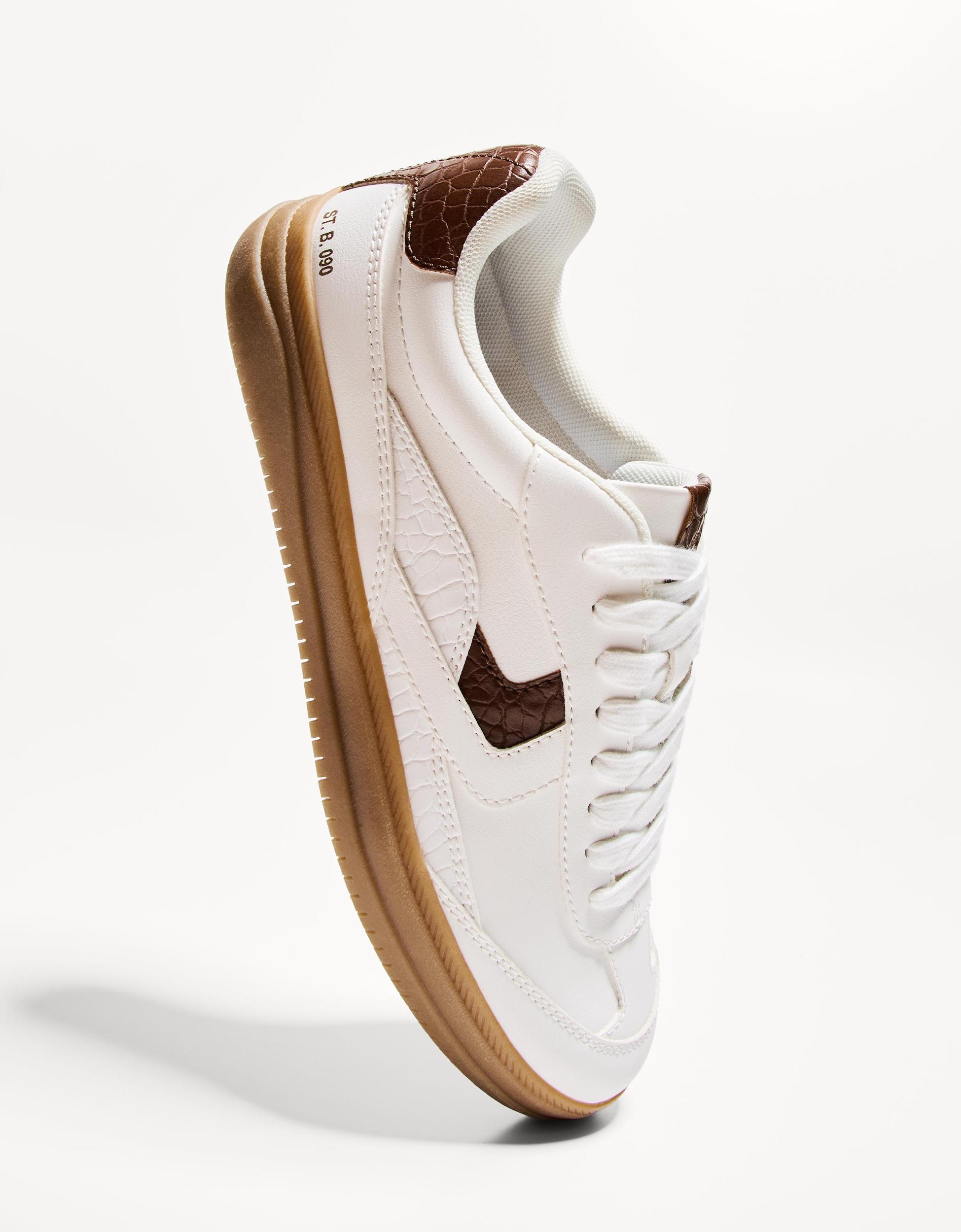 Retro sneakers with animal print details Product Image