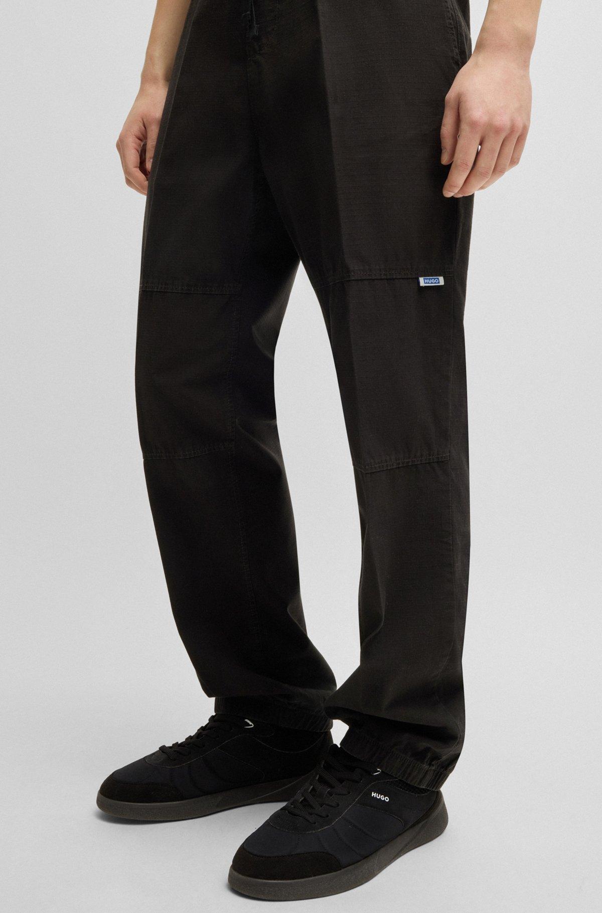 Tapered-fit tracksuit bottoms in ripstop cotton Product Image