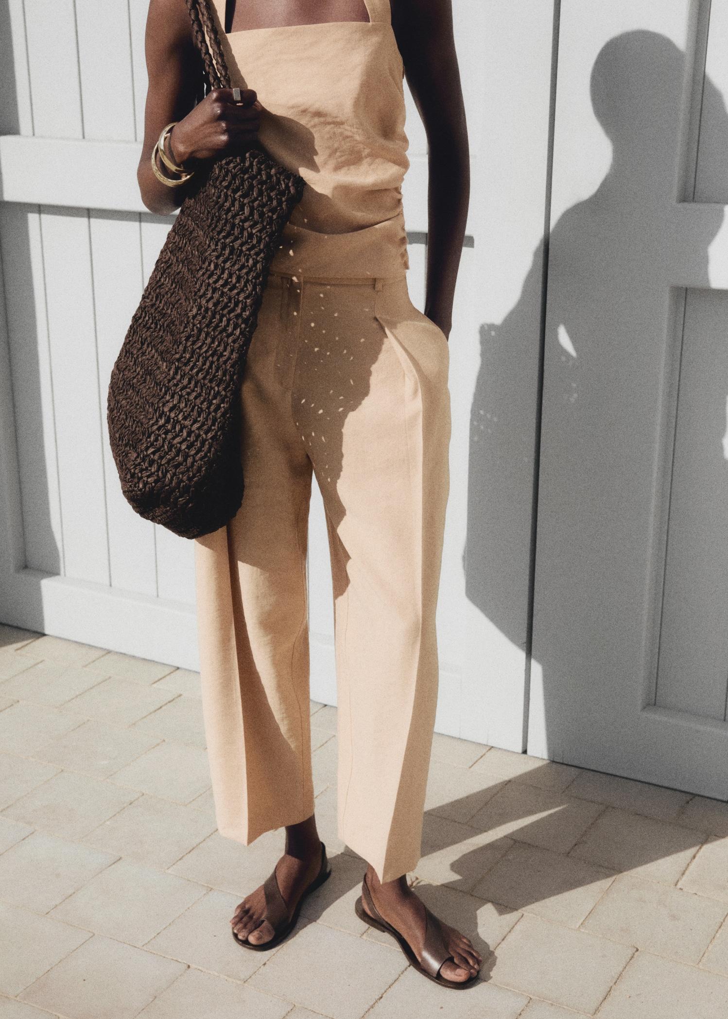 Straight-fit lyocell pants with pleats - Women | MANGO USA Product Image