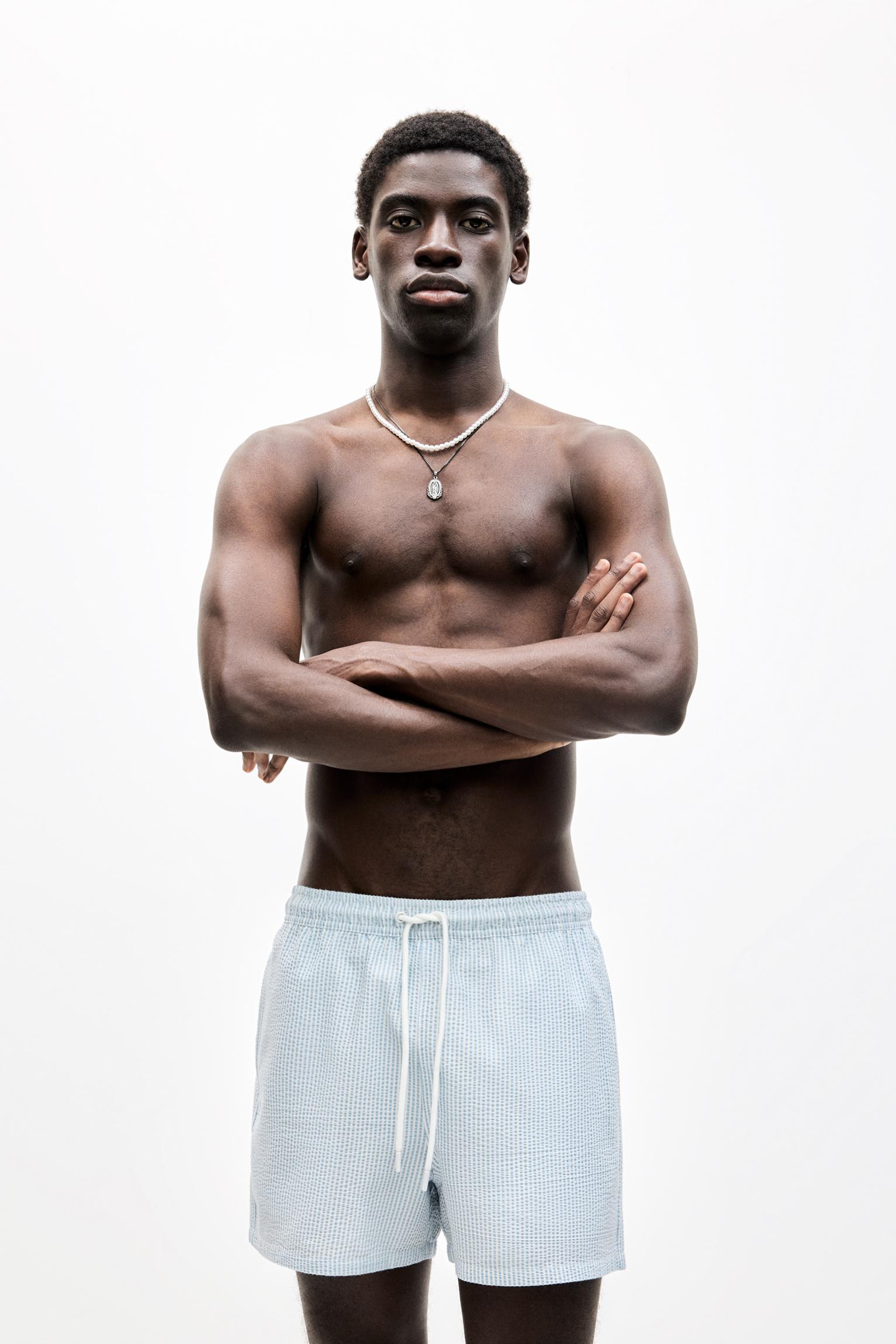 Striped seersucker swimming trunks Product Image