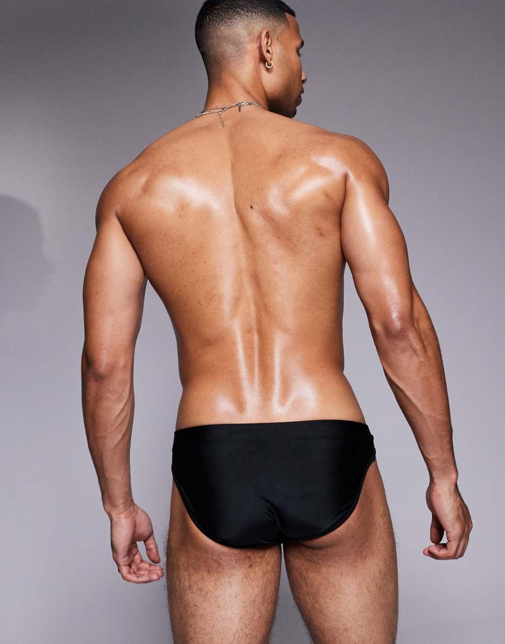 ASOS DESIGN swim briefs in black Product Image