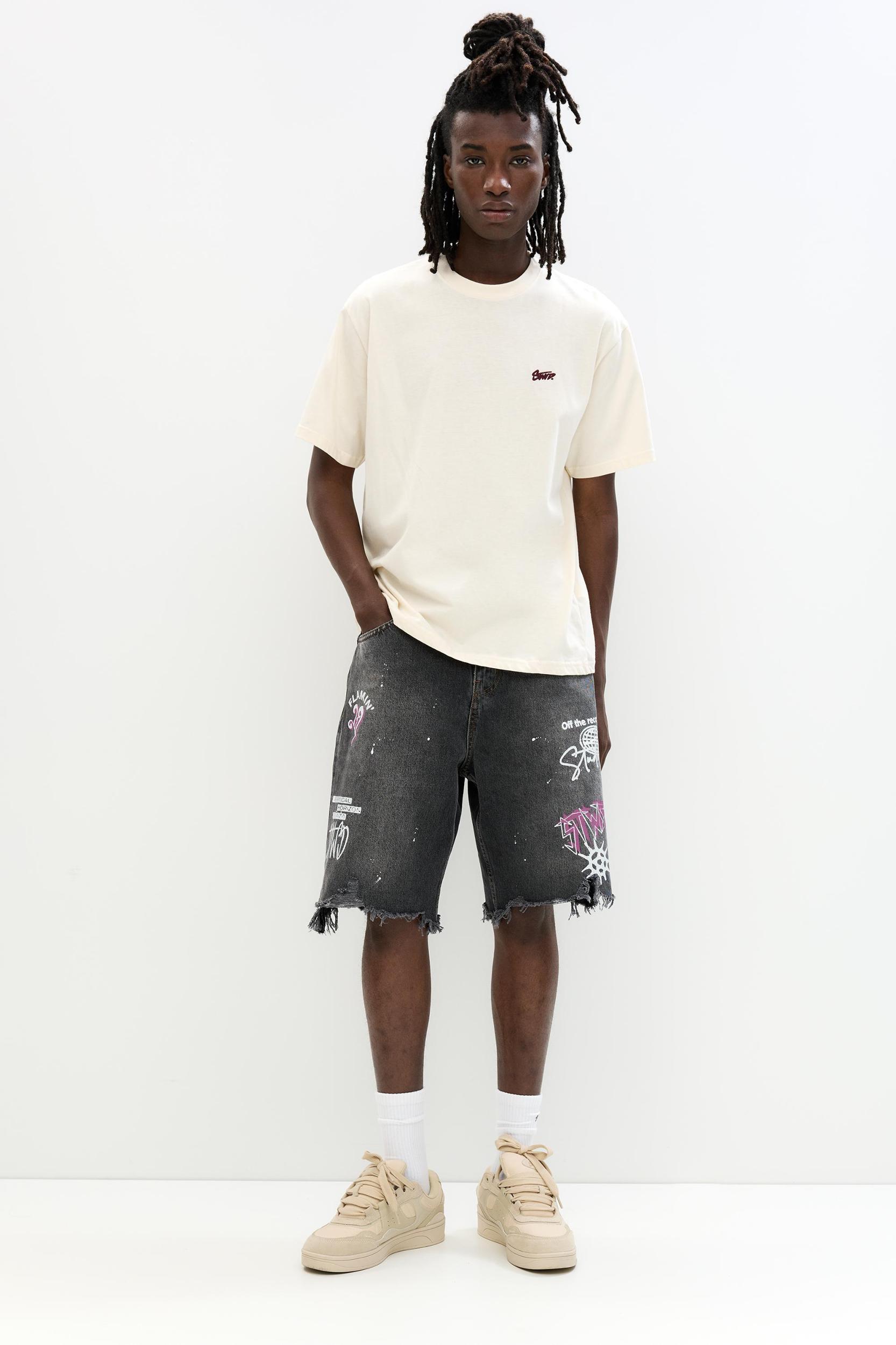 Ripped denim Bermuda shorts Product Image